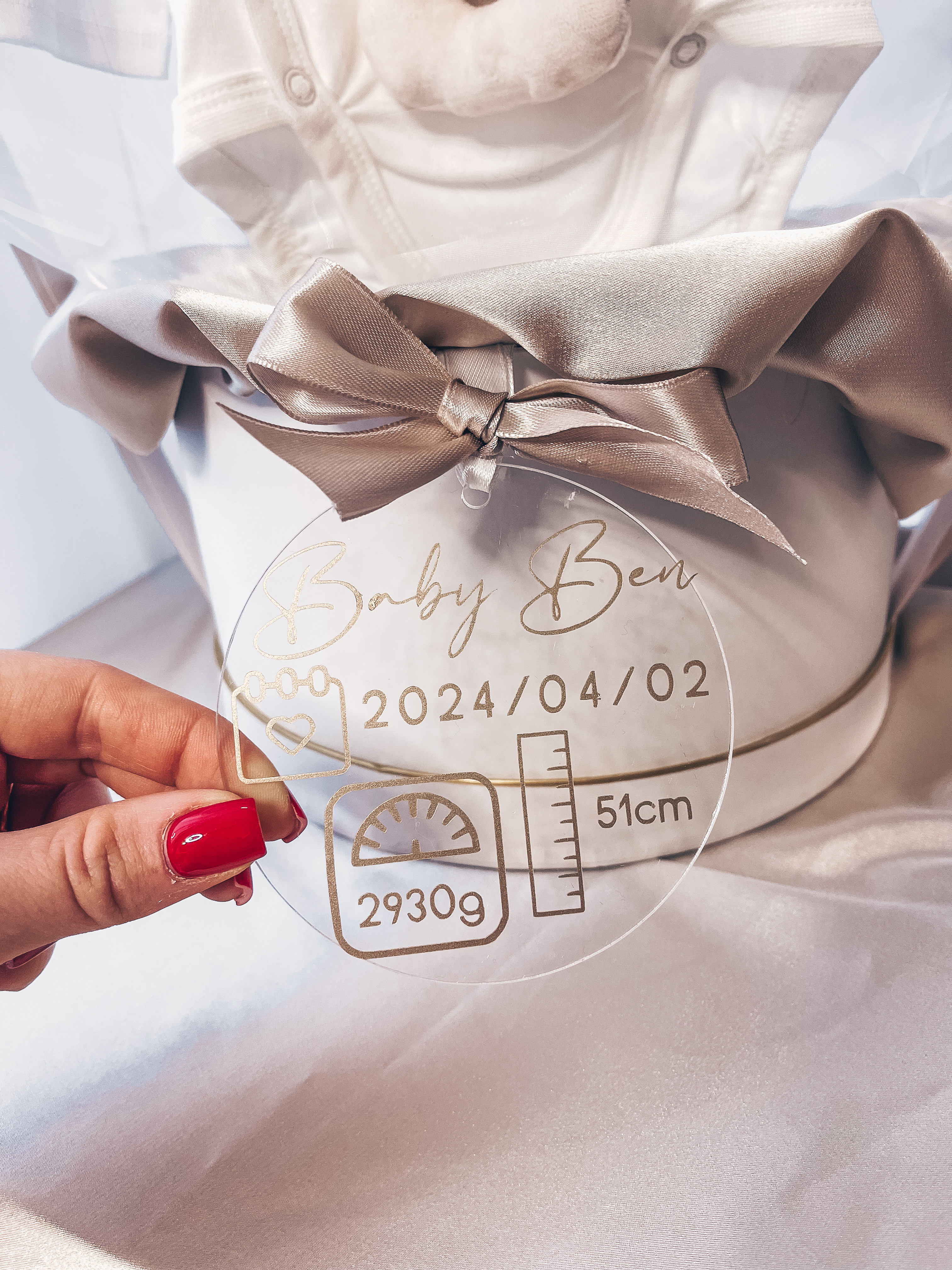 Dovana "Baltas kompletukas su barškučiu"