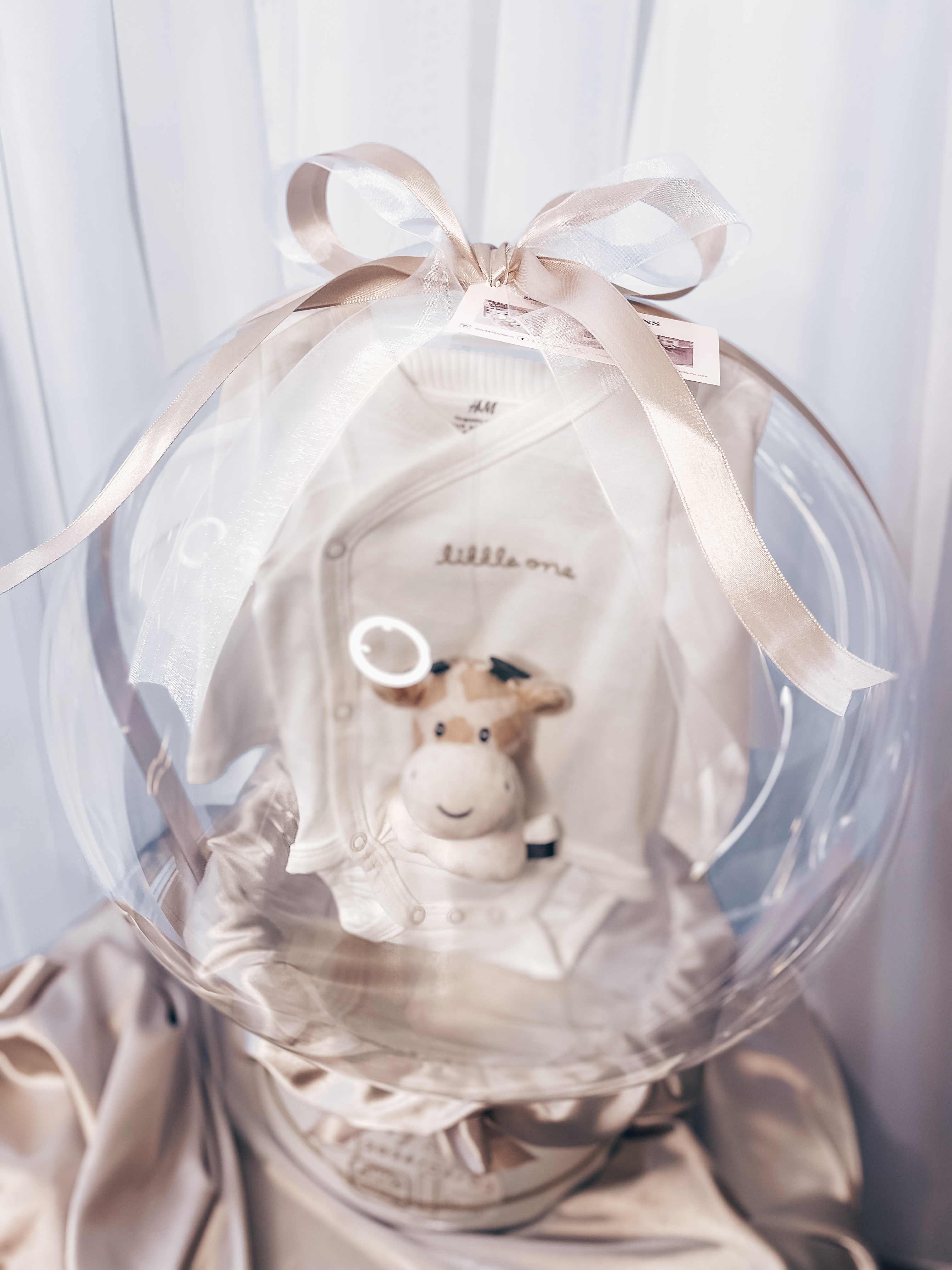 Dovana "Baltas kompletukas su barškučiu"