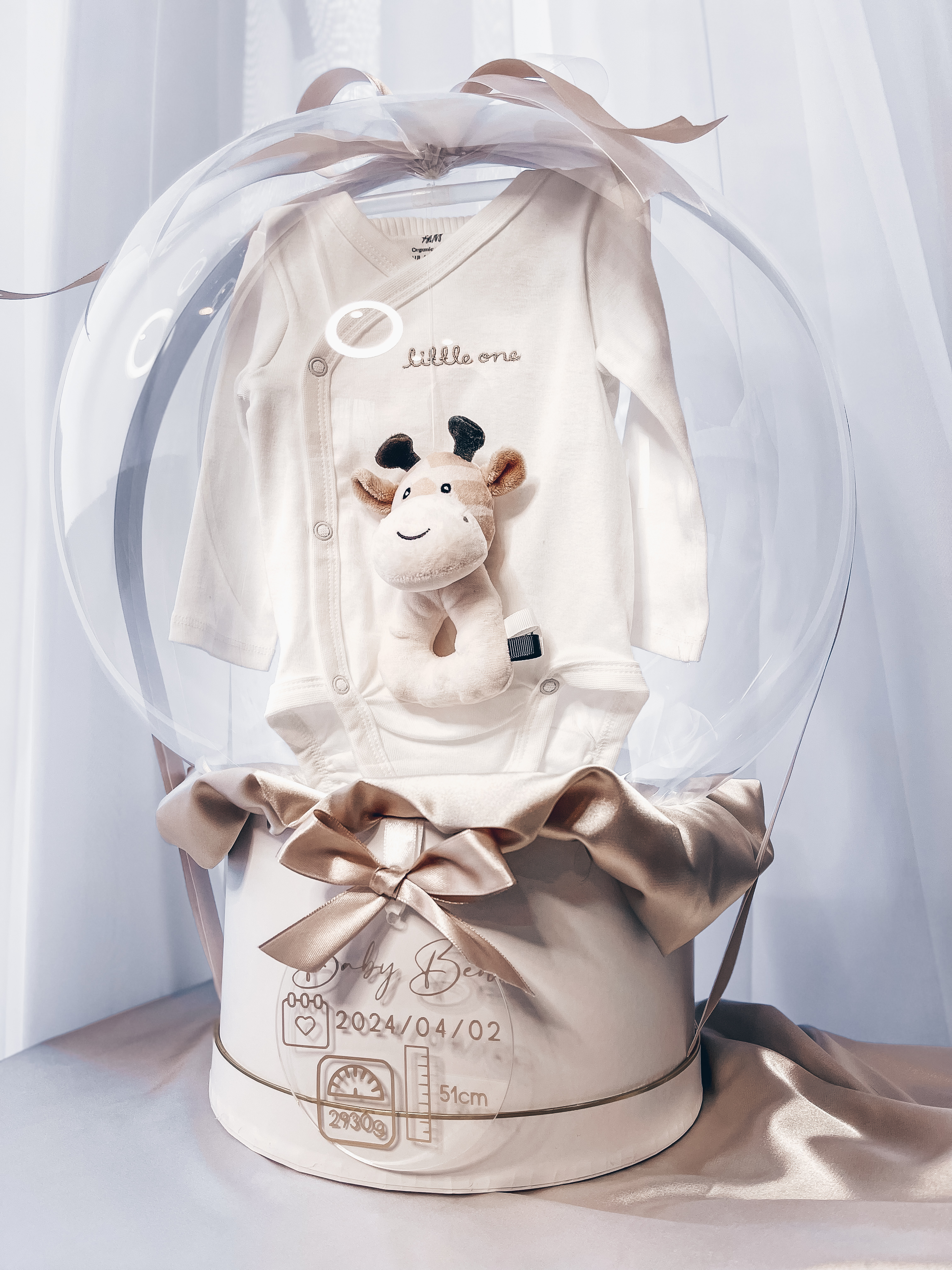 Dovana "Baltas kompletukas su barškučiu"