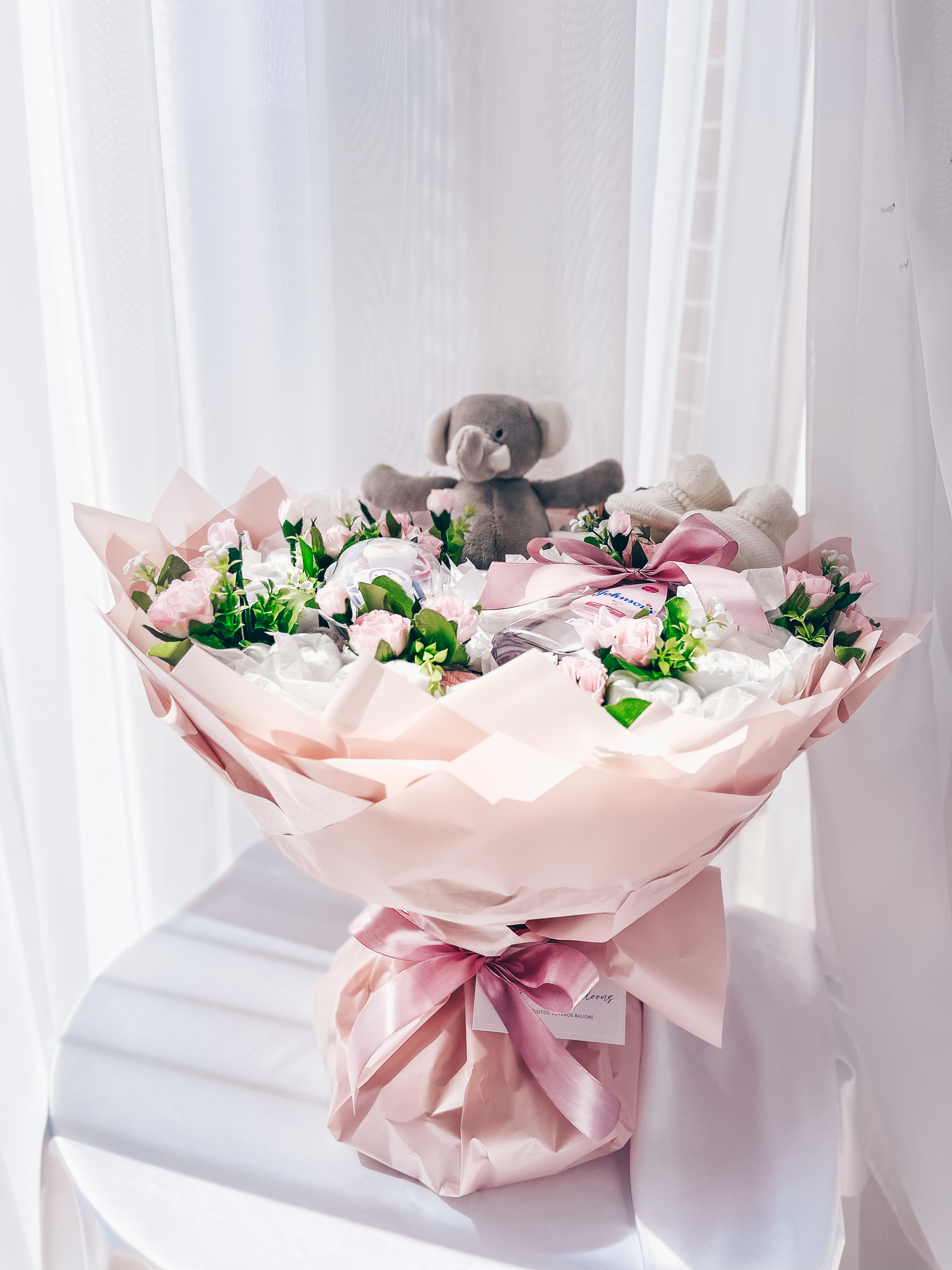 Dovana "Rožinė sauskelnių puokštė"