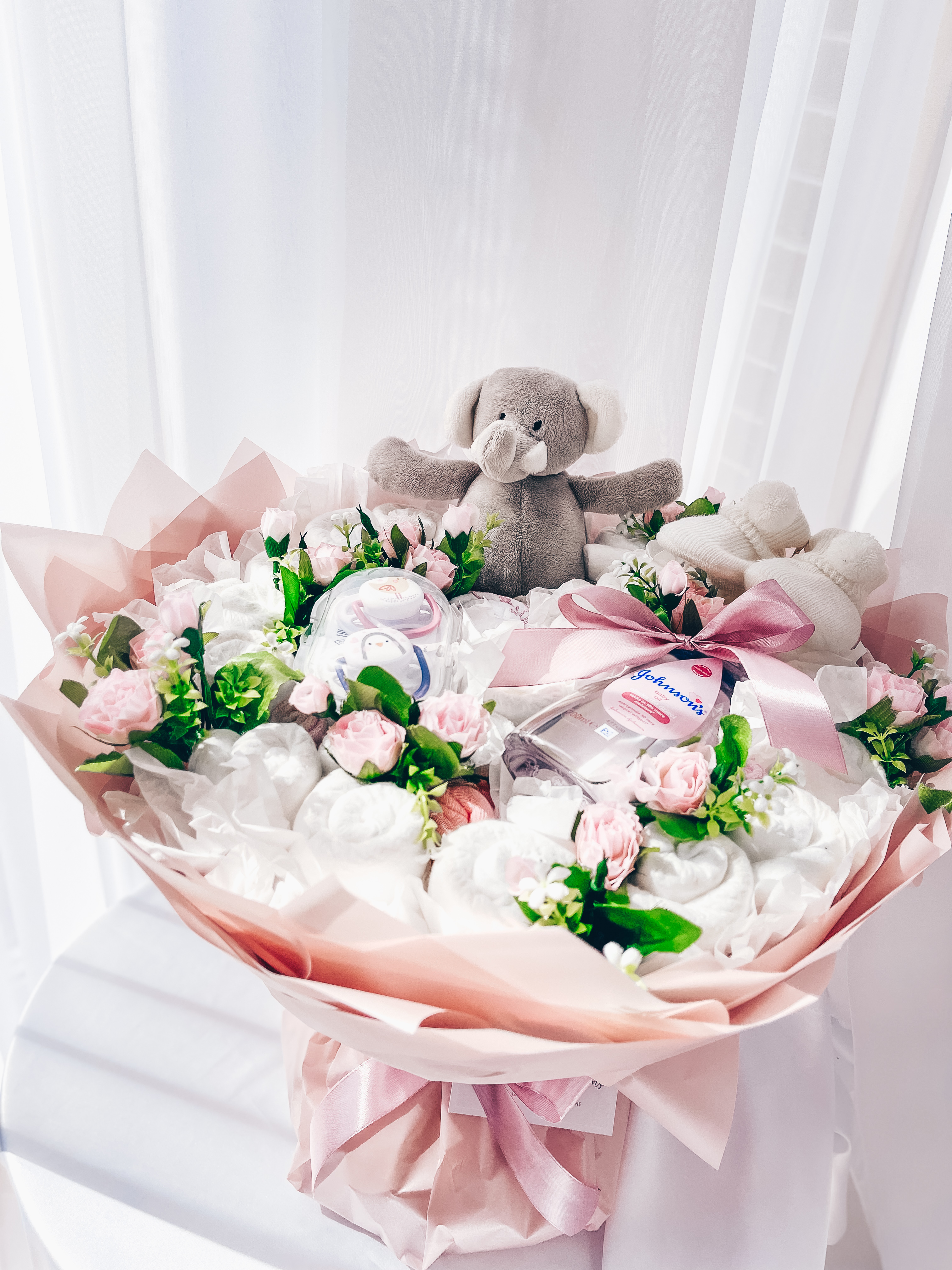 Dovana "Rožinė sauskelnių puokštė"