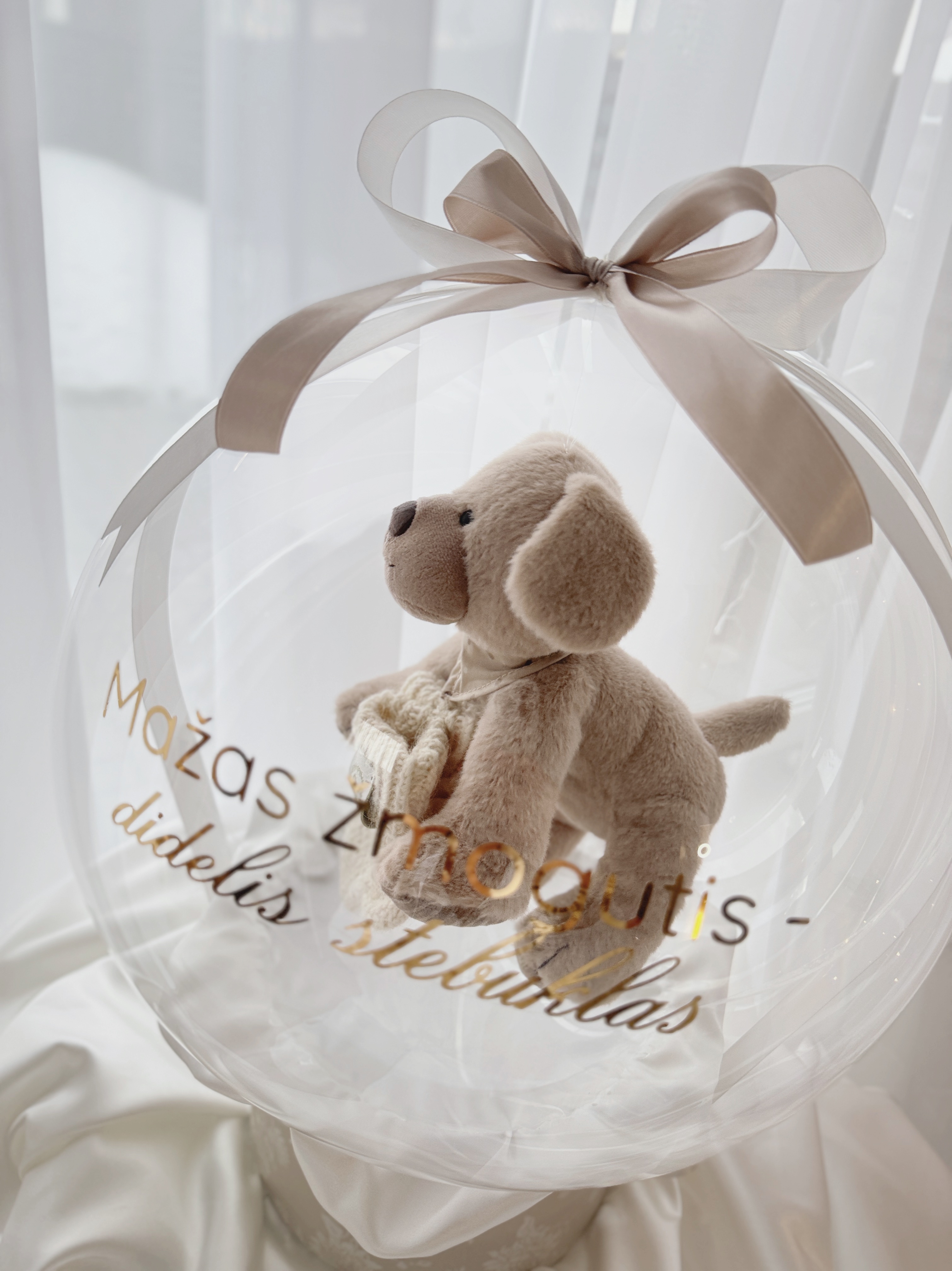 Dovana "Neutralus barškutis/žaisliukas su kojinytėmis"