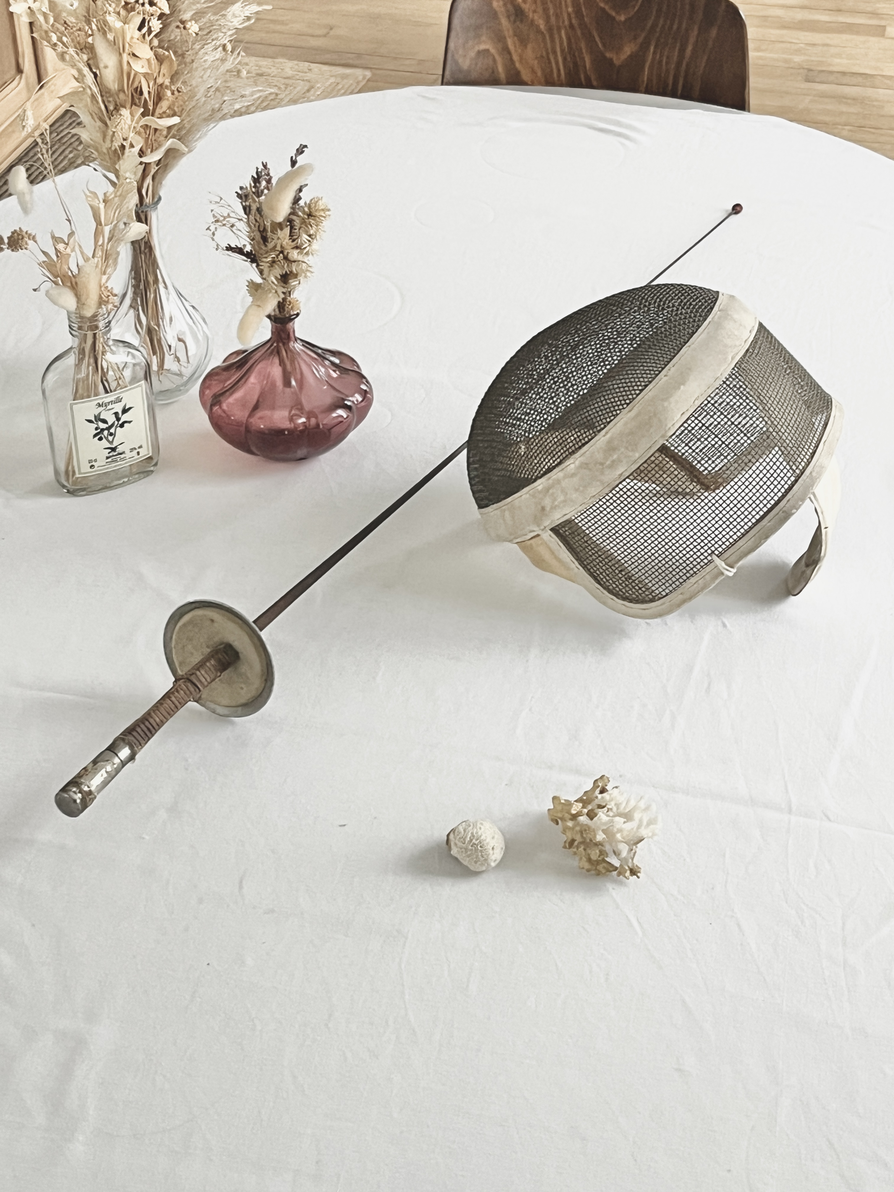 Épée de fleuret et masque d’escrime