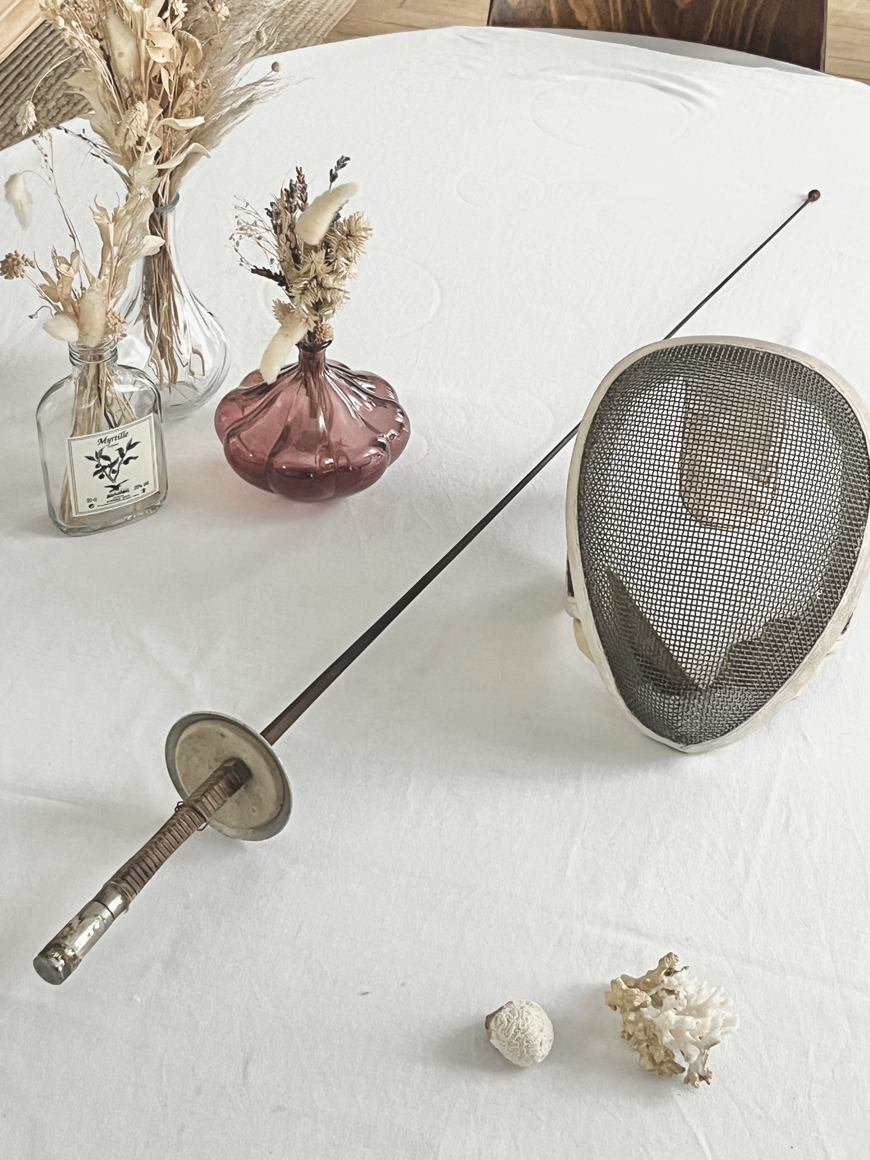 Épée de fleuret et masque d’escrime