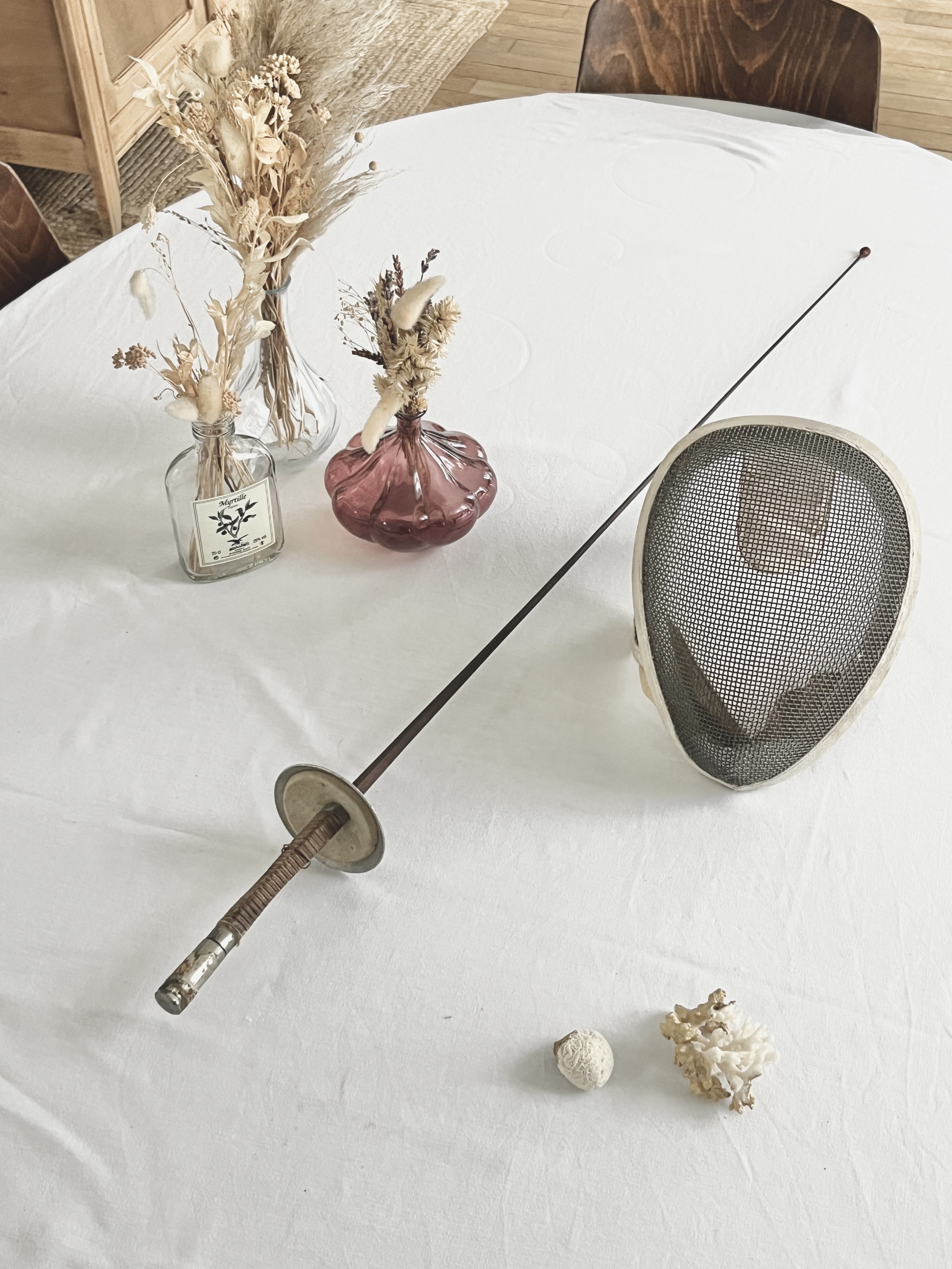 Épée de fleuret et masque d’escrime