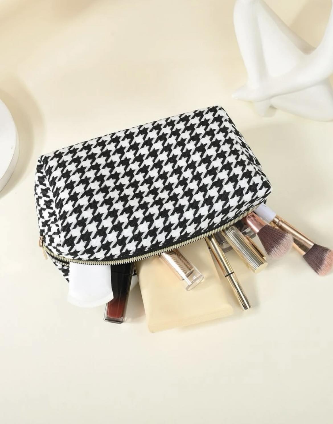 Žąsies kojelės rašto kosmetinė