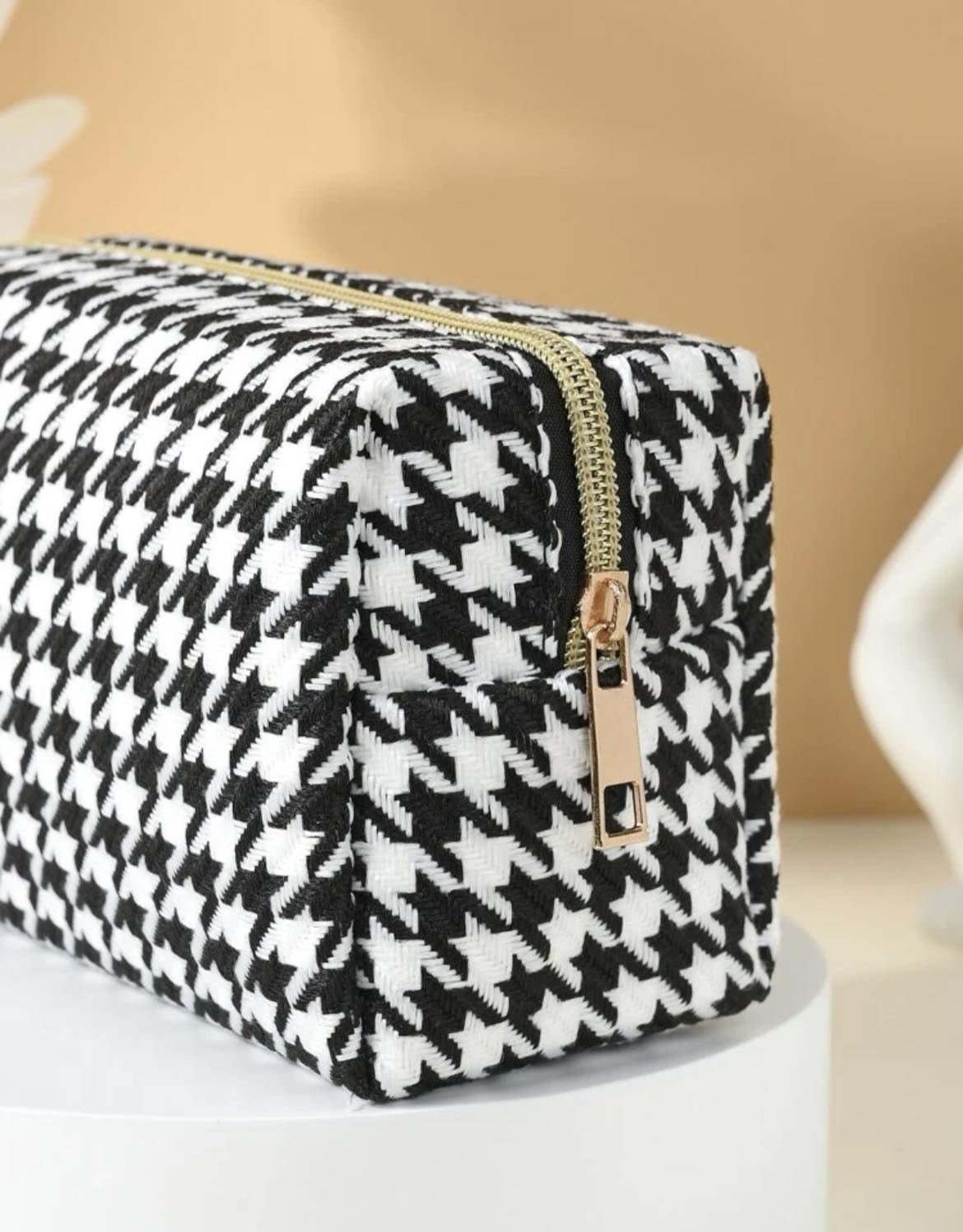 Žąsies kojelės rašto kosmetinė