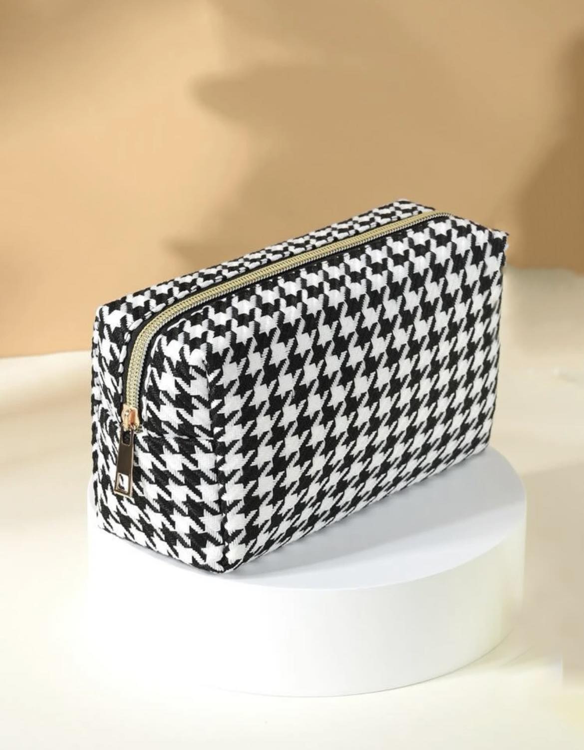 Žąsies kojelės rašto kosmetinė