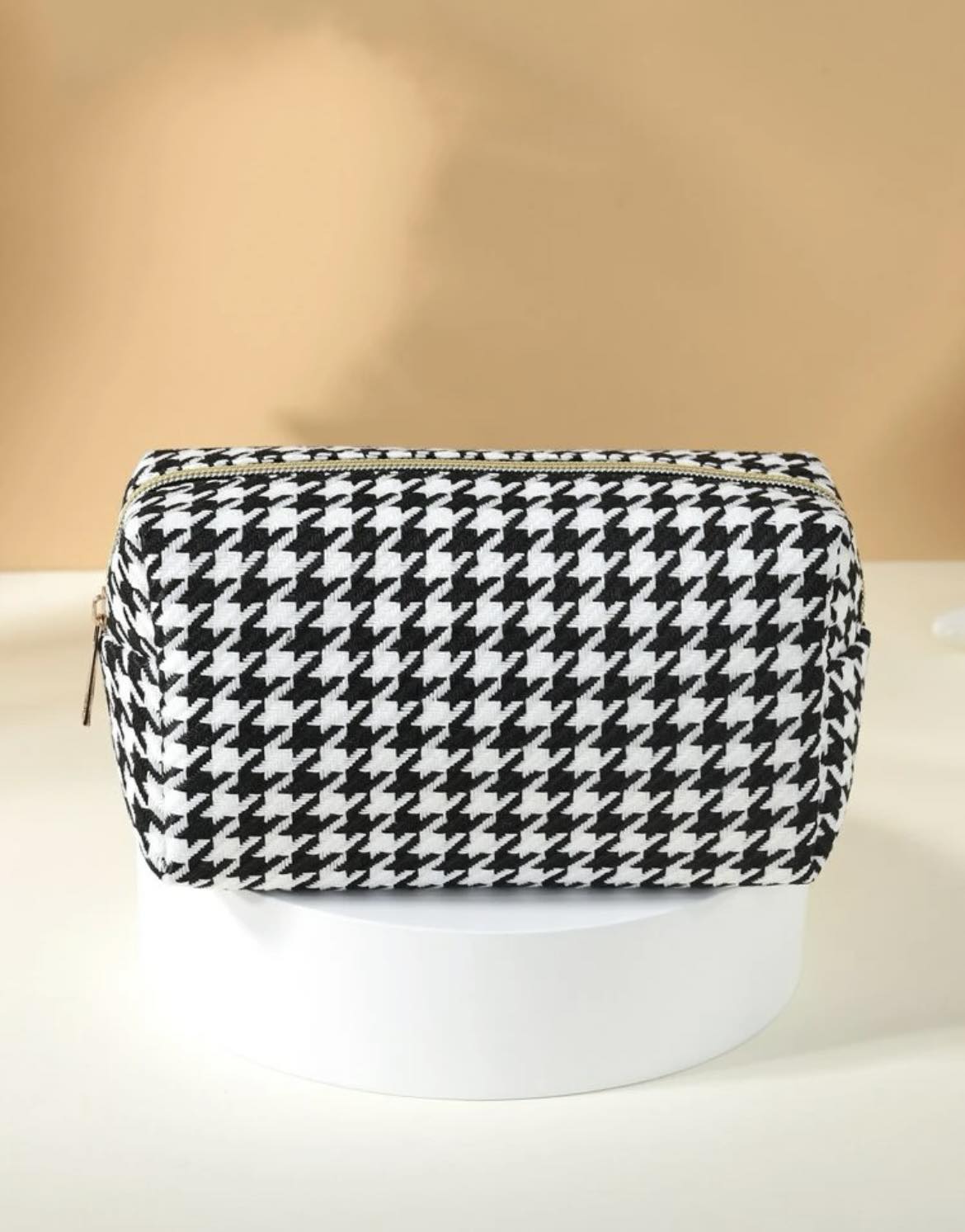 Žąsies kojelės rašto kosmetinė