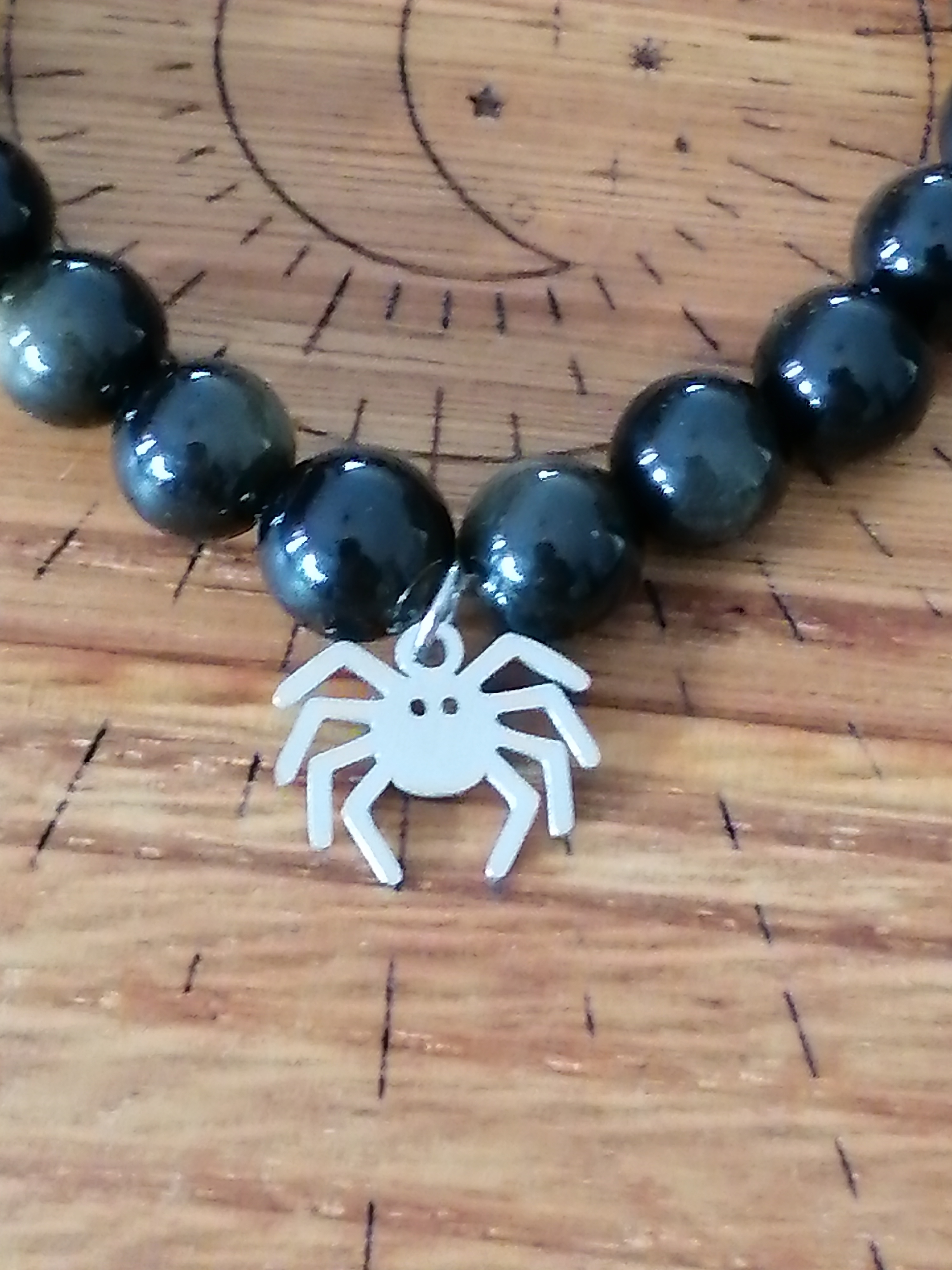 Bracelet "araignée" en obsidienne dorée 