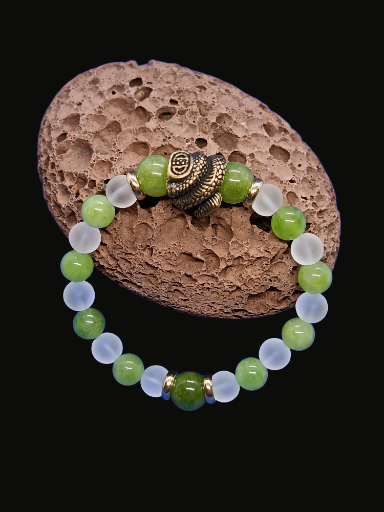 Bracelet "serpent" en péridot et cristal de roche mat