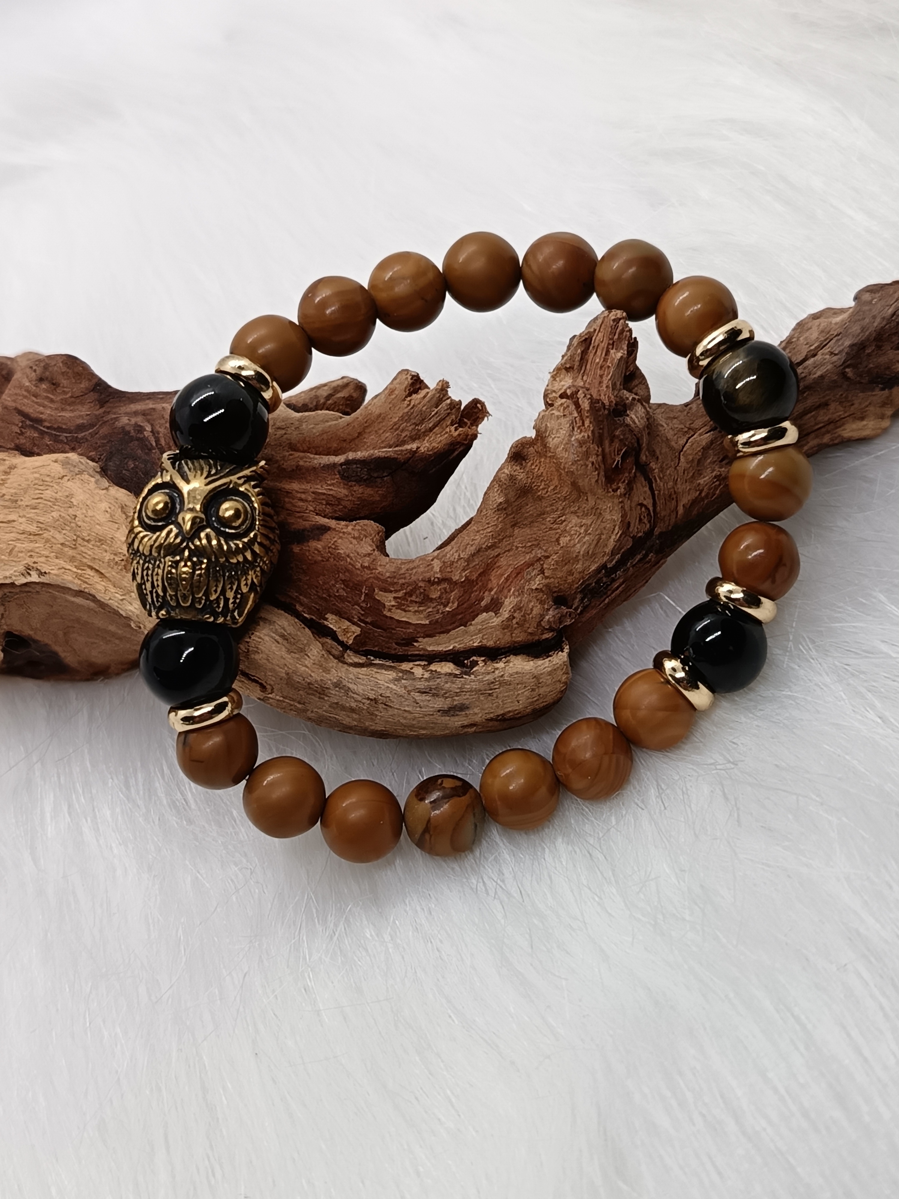 Bracelet "hibou" en bois fossilisé et œil de faucon 