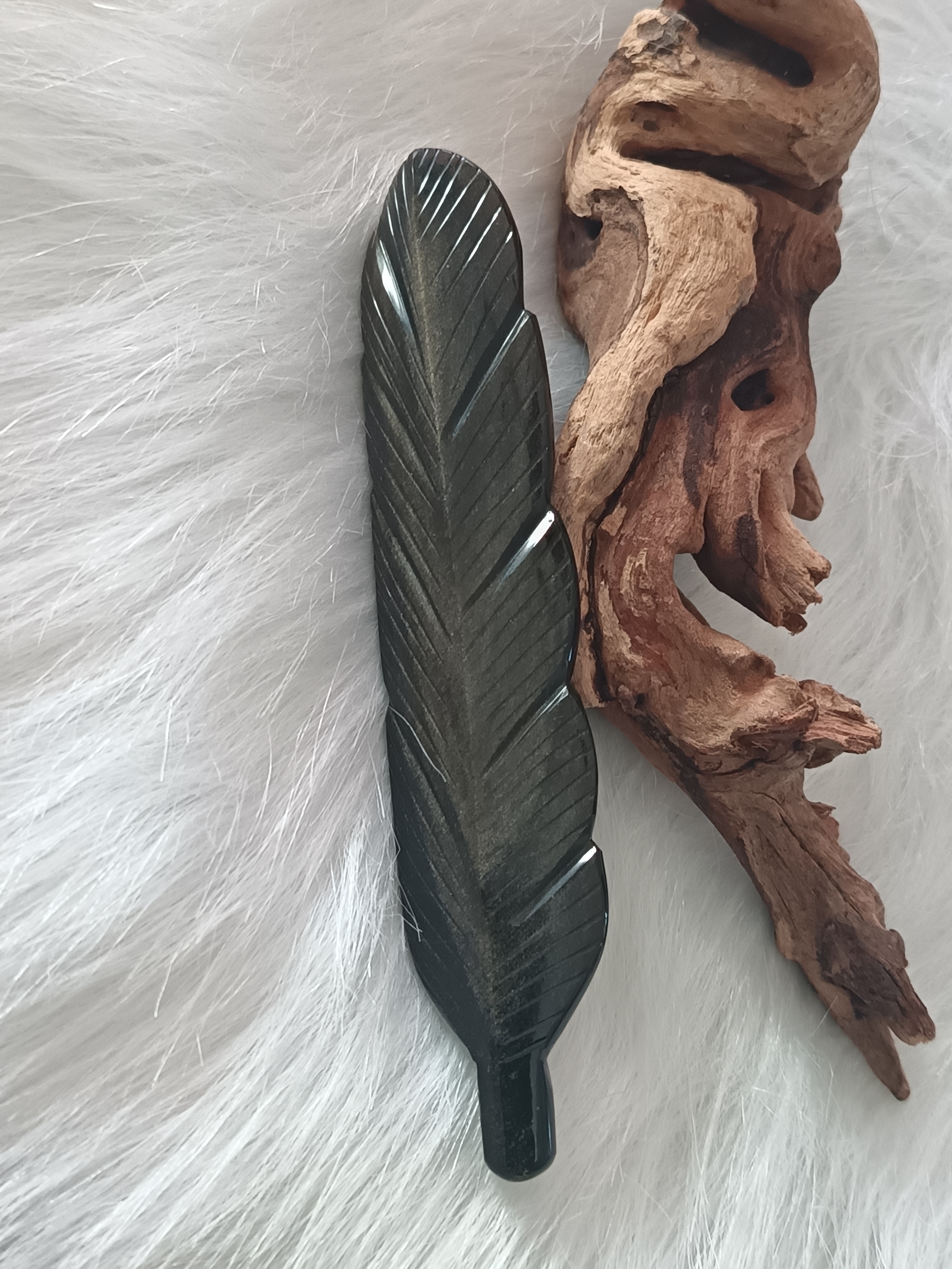 Plume en obsidienne dorée