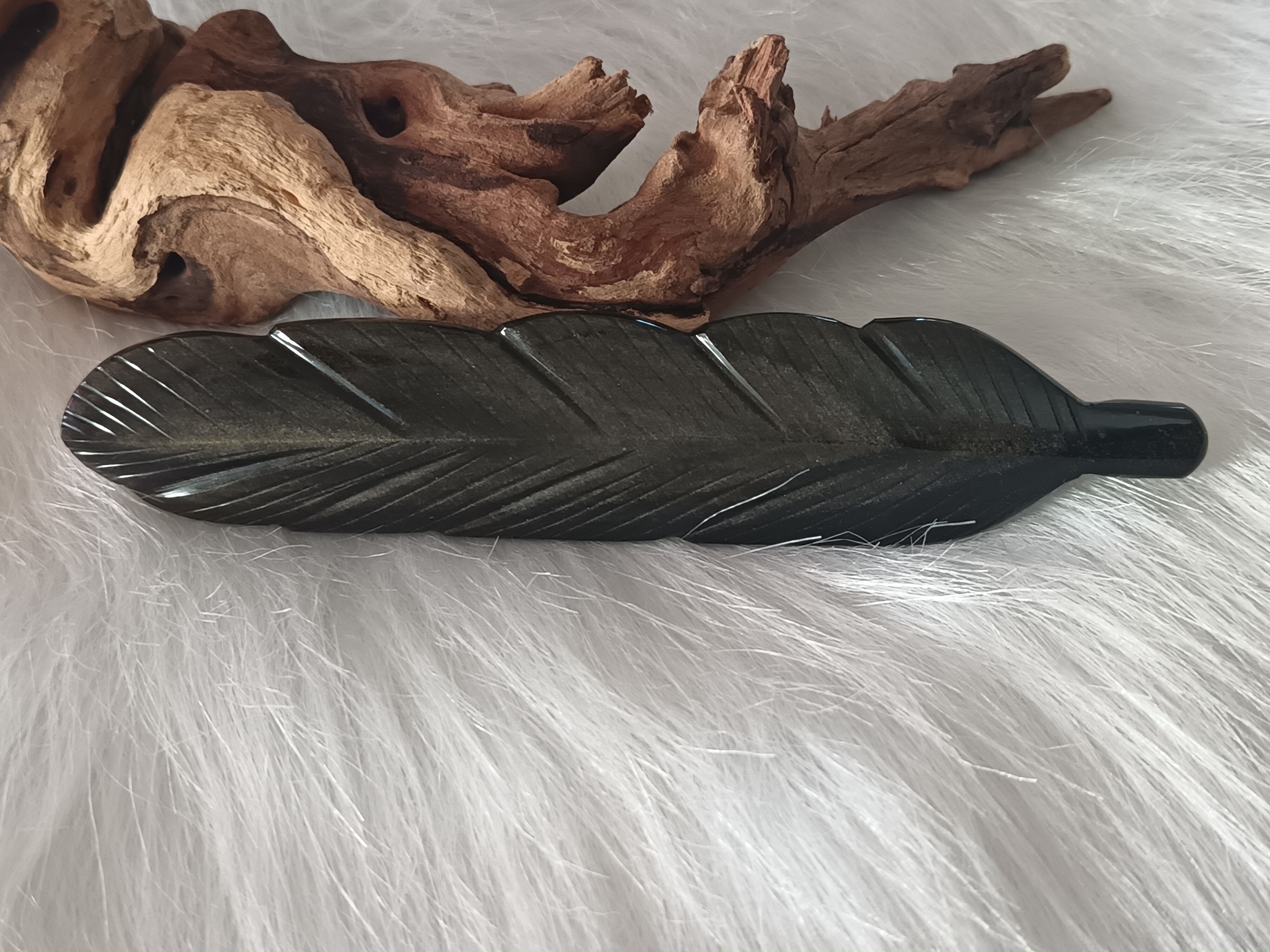 Plume en obsidienne dorée