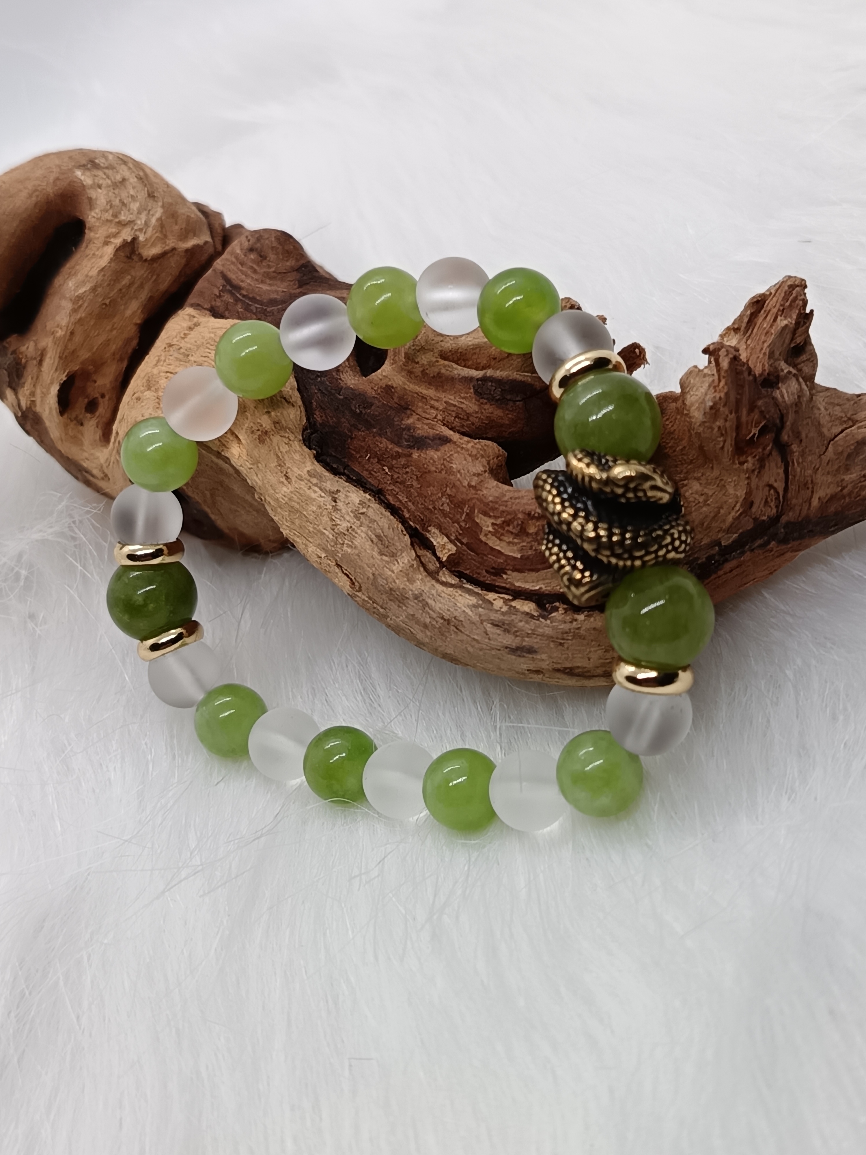 Bracelet "serpent" en péridot et cristal de roche mat