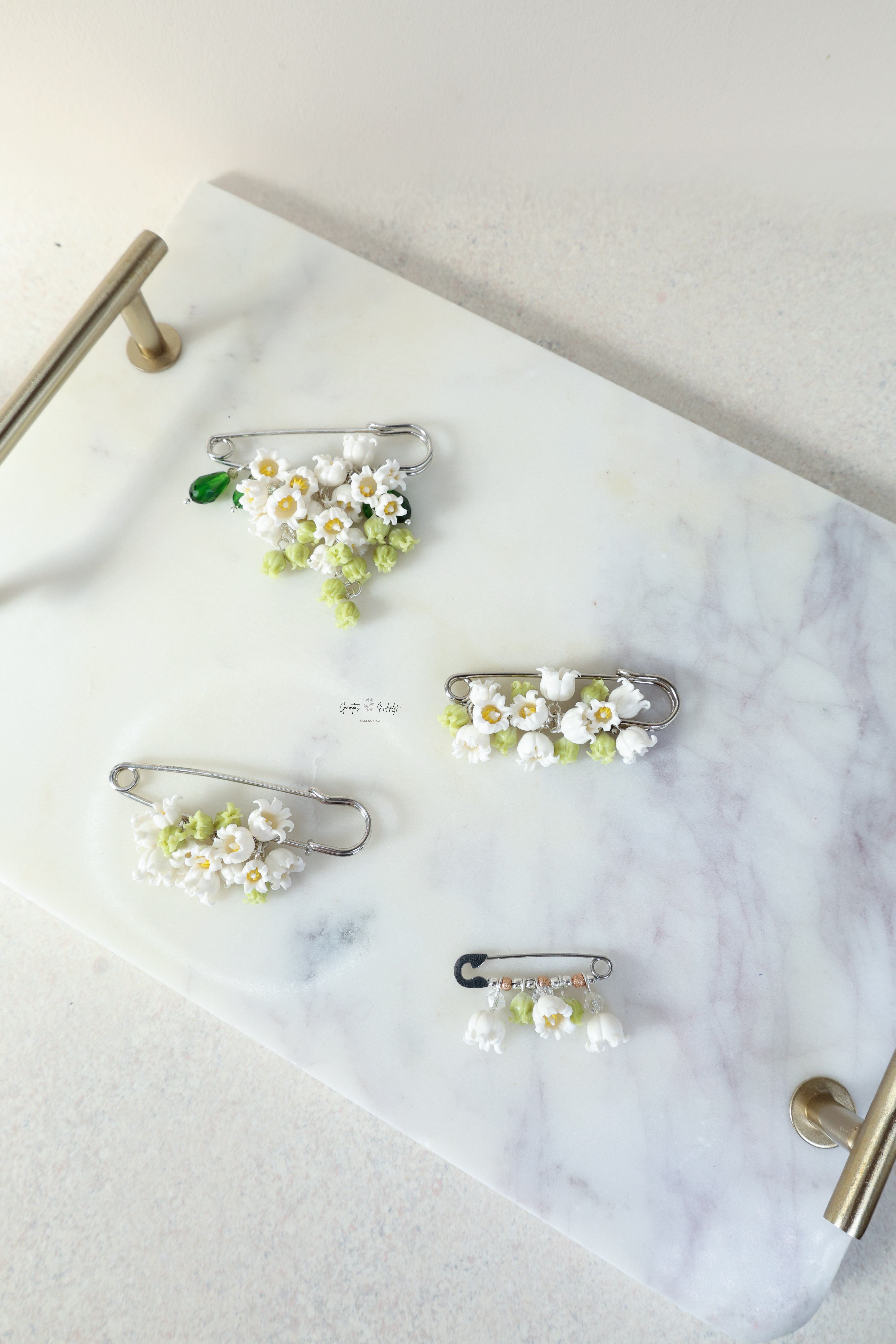 SAGĖ "PAKALNUTĖS" SU ŽIOGELIU