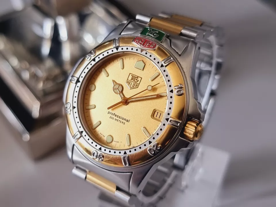 tag heuer 4000 Mens full size In Very Good condition Stunning Gold Steel Combo