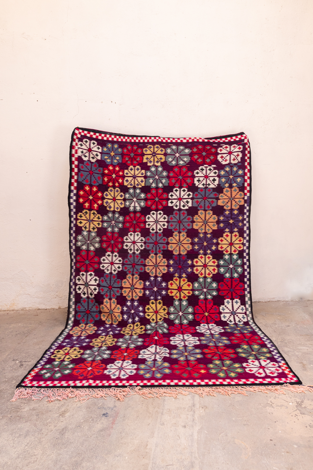 Tapis nomade vintage avec motifs géométriques - Vintage nomadic rug with geometric patterns