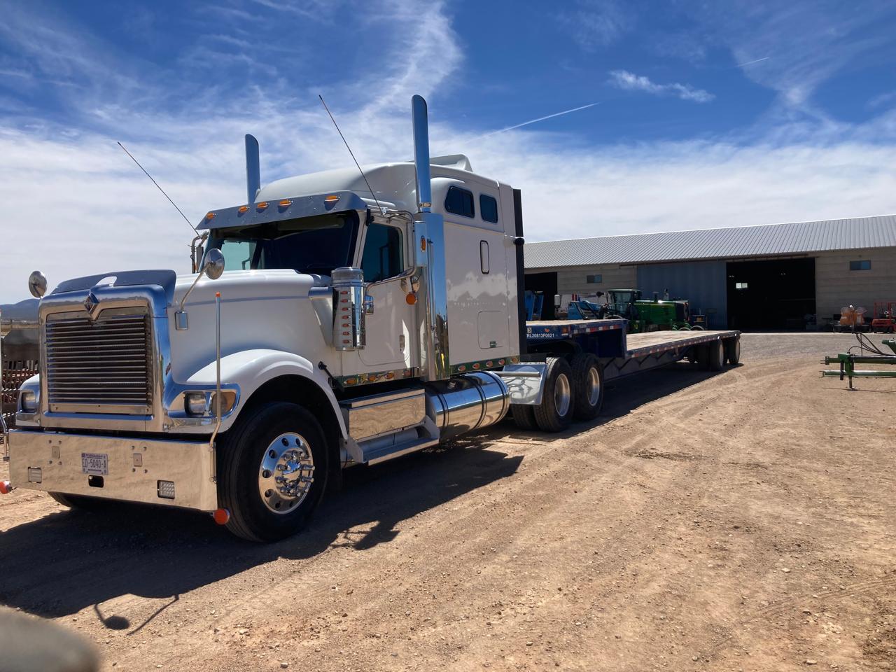2009 Internacional - Cummins - Manual y  2014 Plataforma Great Dane 52 pies
