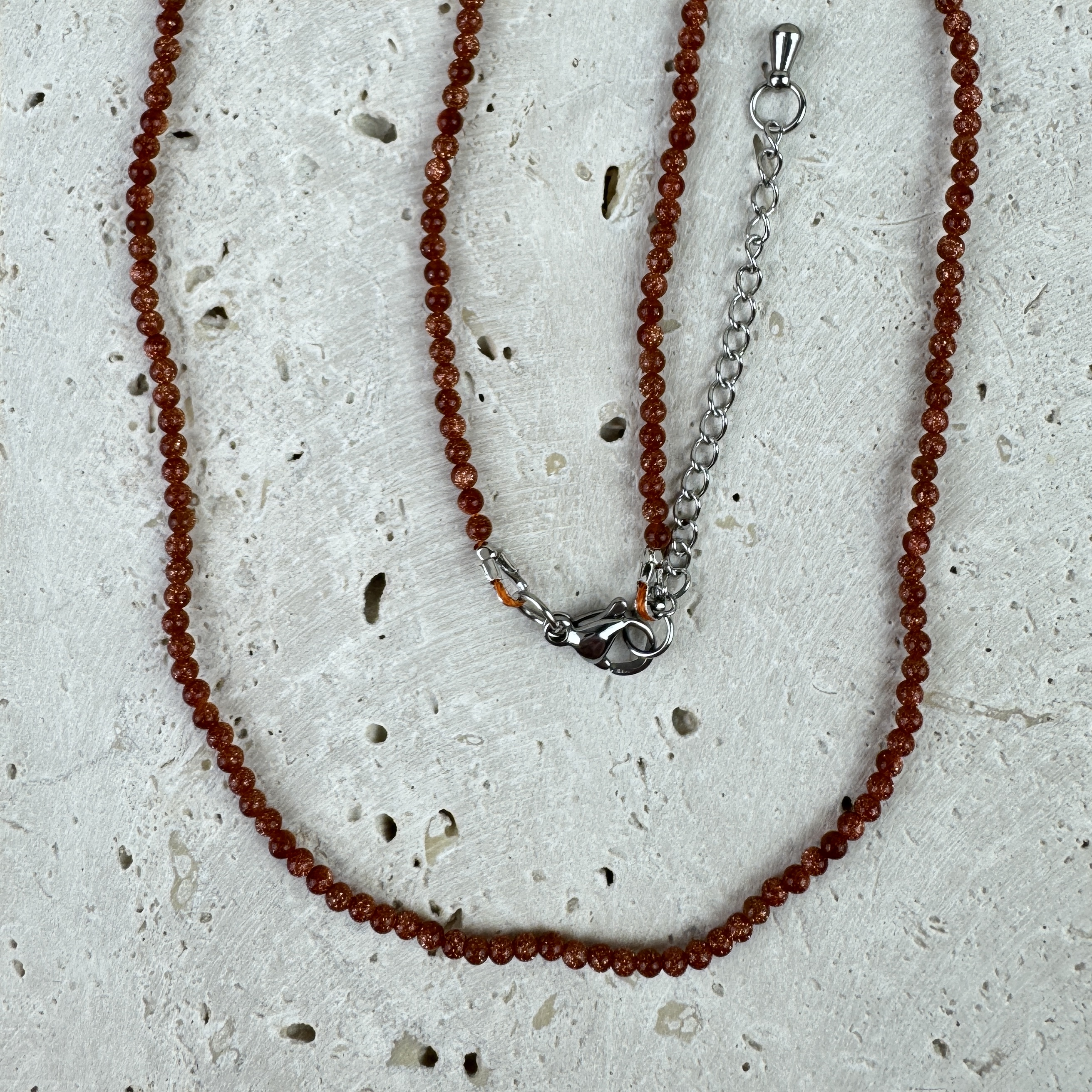 Saulės akmens vėrinys - Saulėlydžio švytėjimas