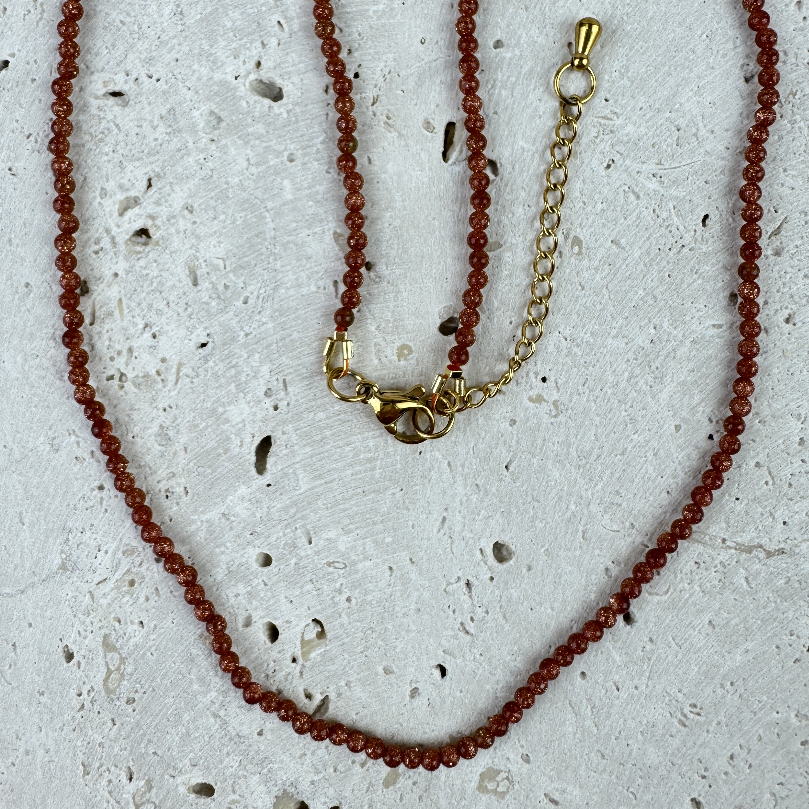 Saulės akmens vėrinys - Saulėlydžio švytėjimas