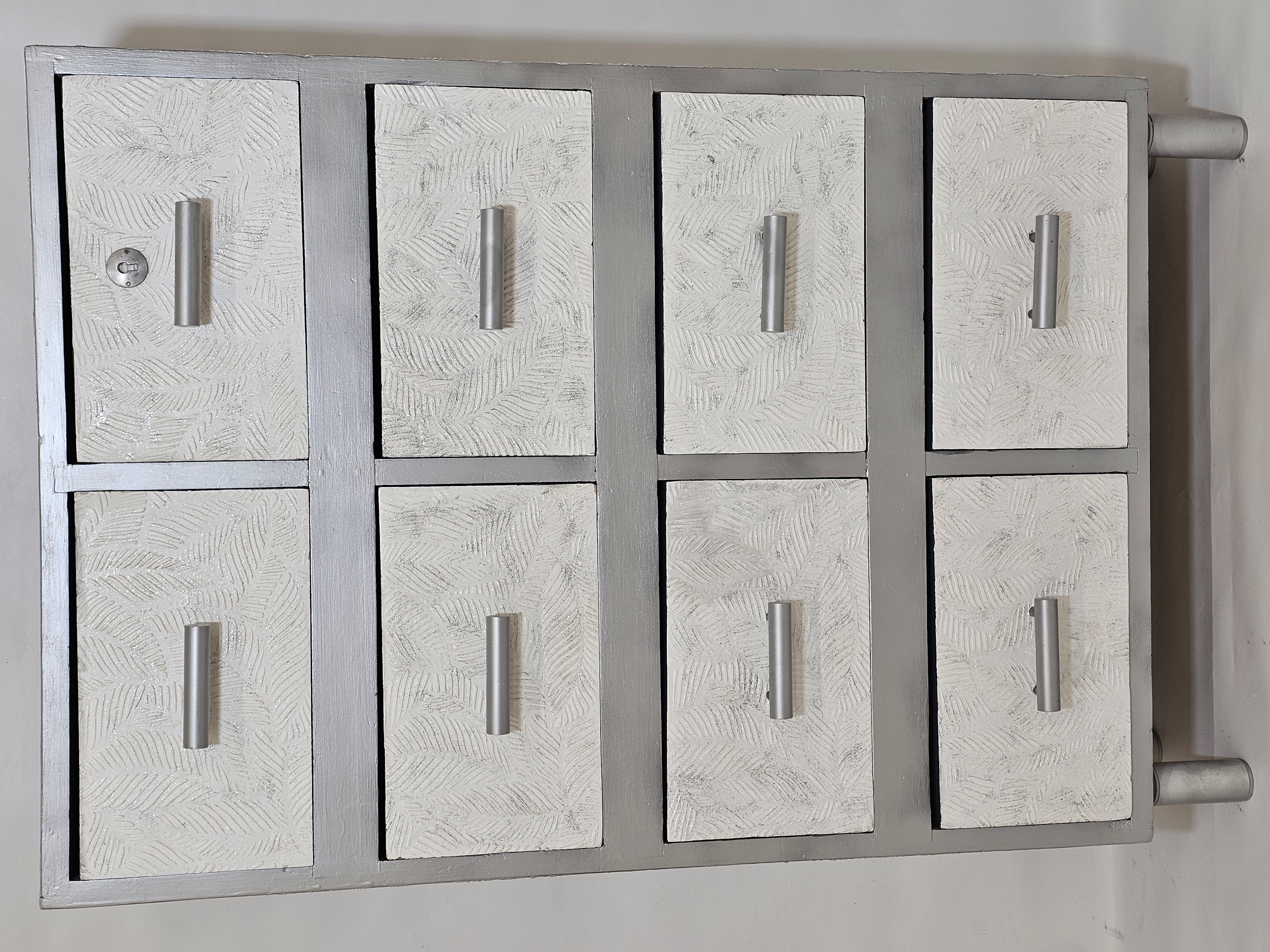 Meuble 8 tiroirs casse tête