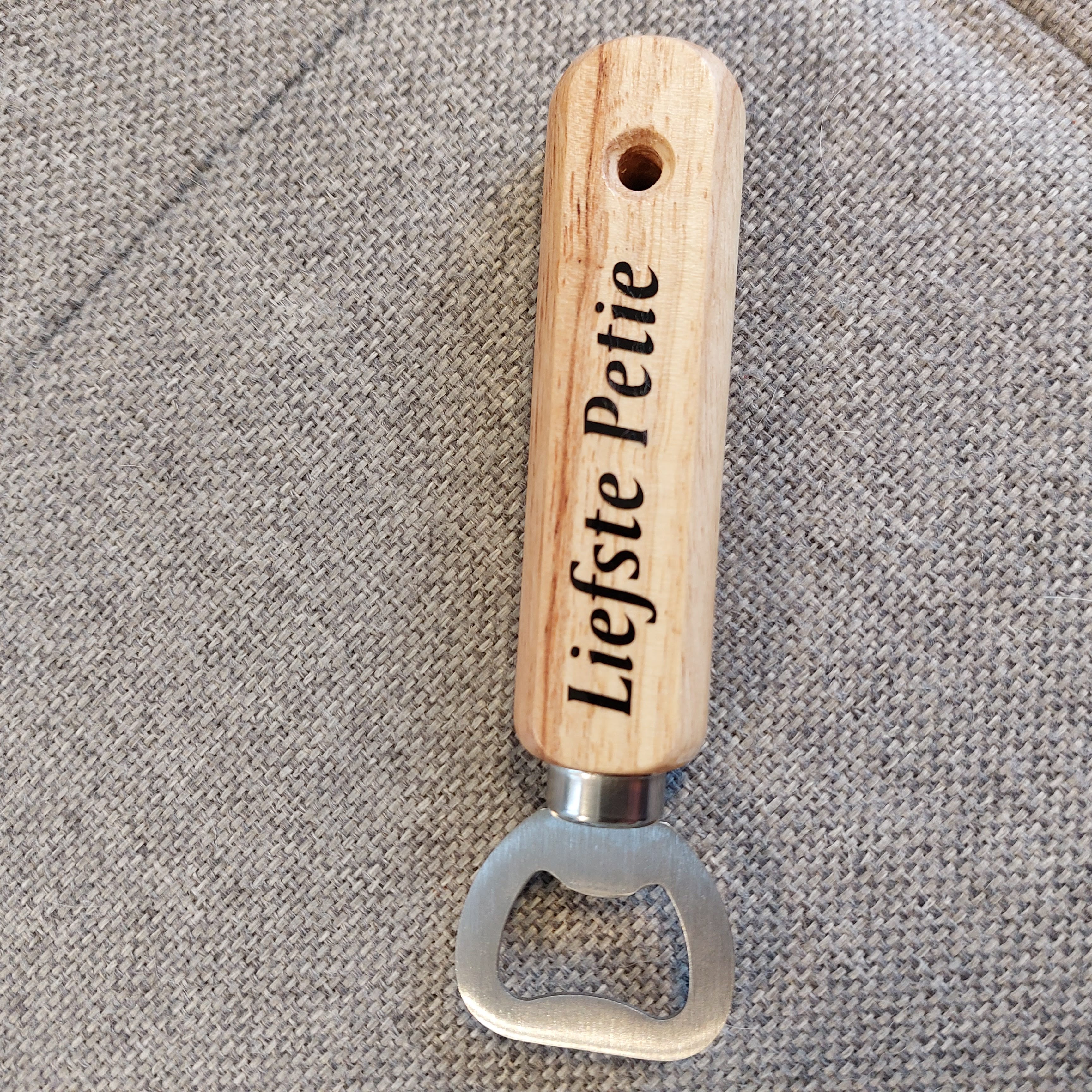 Flessenopener met houten handvat