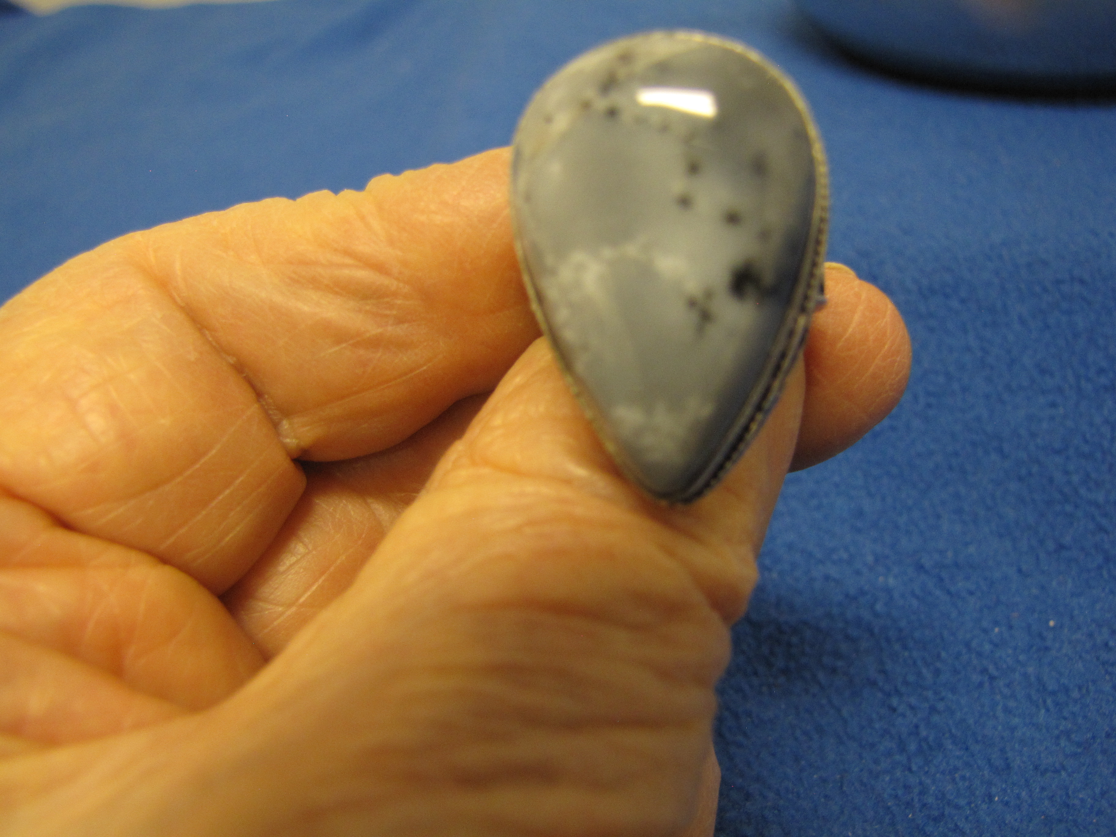 Ring multishades of gray. Stone unknown. Size 7 Sterling.