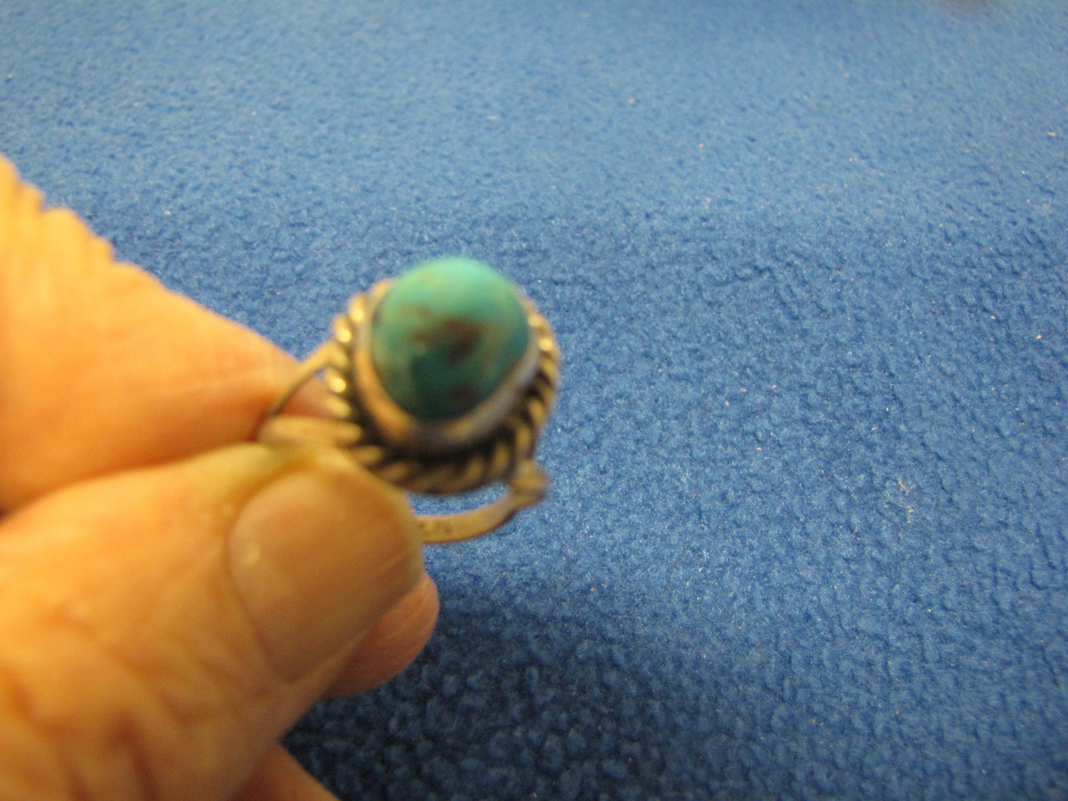 Ring - Gold Colored metal, light shades of green setting. Size 5