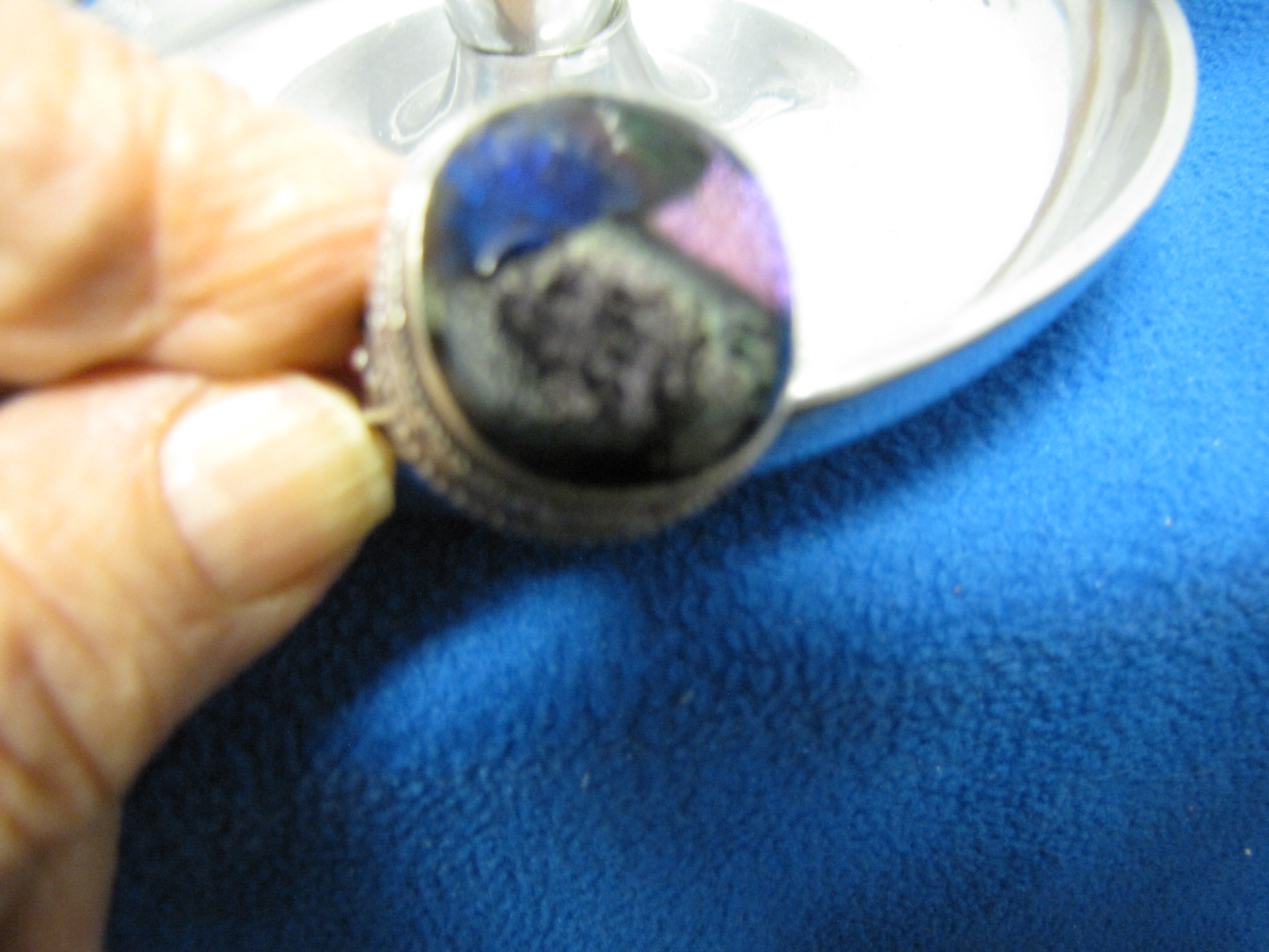 Ring - Miltishades of dark to light Purple. Stone unknown. Size 6