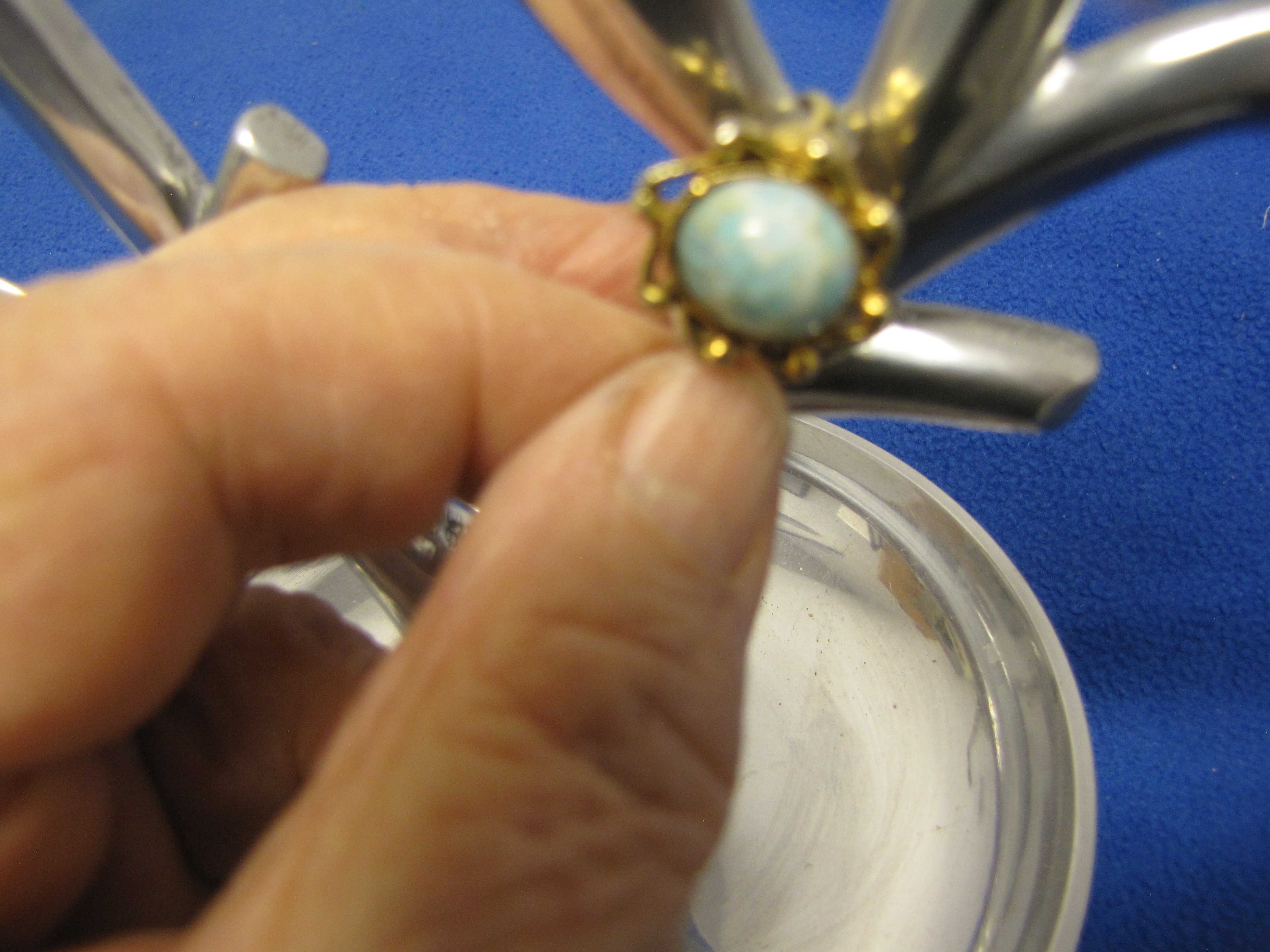 Ring - Gold Colored - Light green with dark green inlays, stone unknown. Size 7 