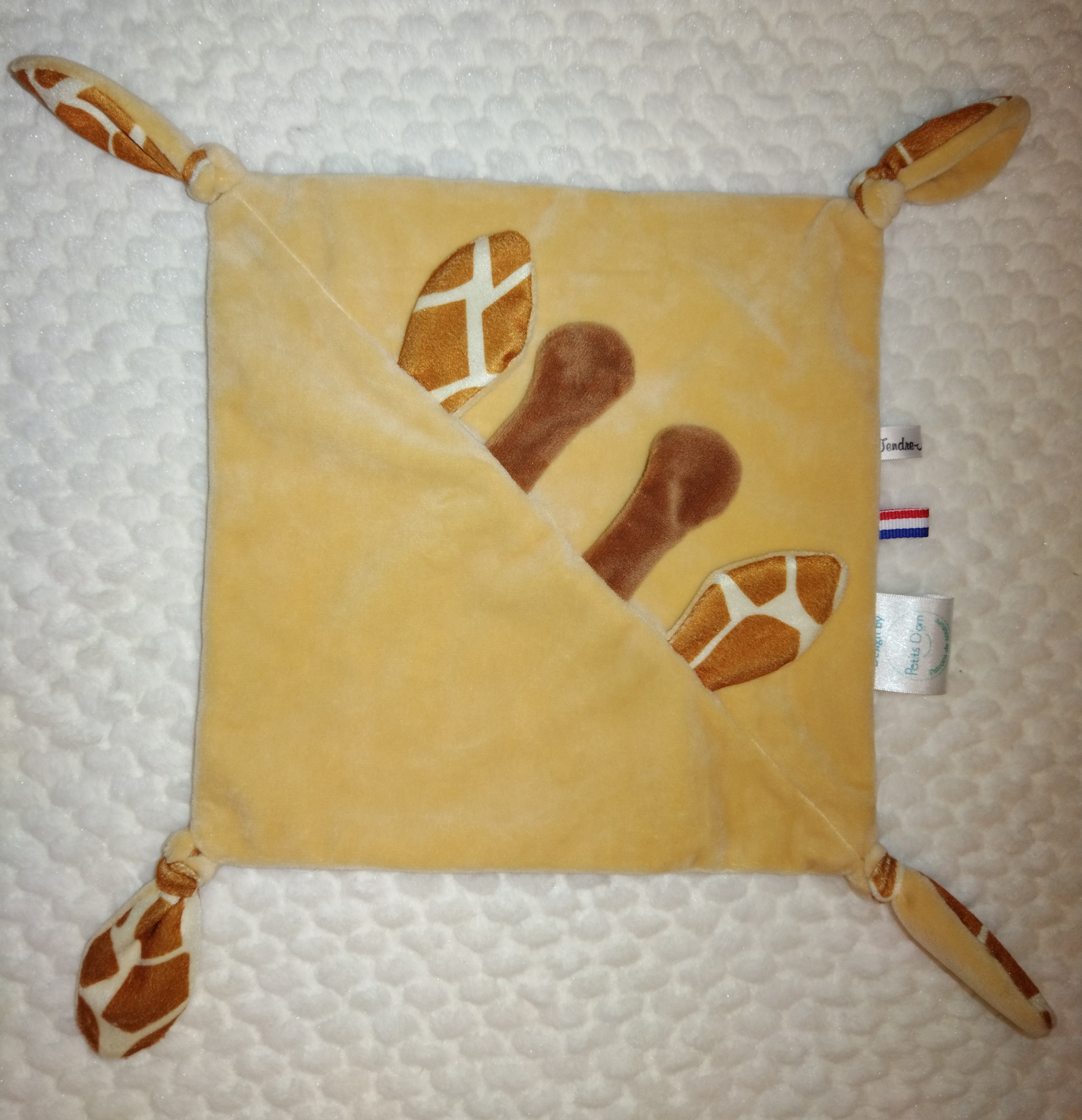 Tendre doudou girafon 