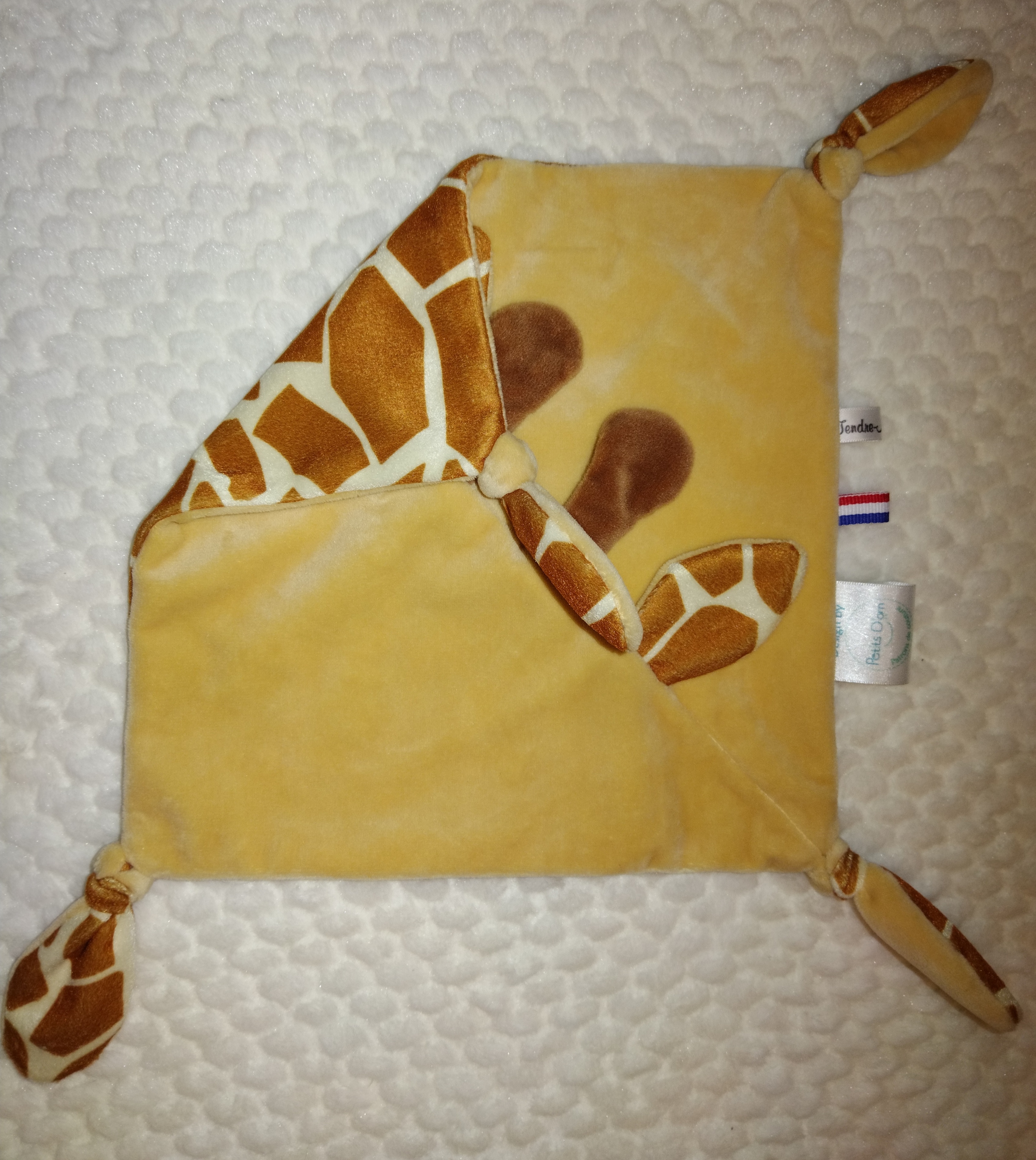 Tendre doudou girafon 