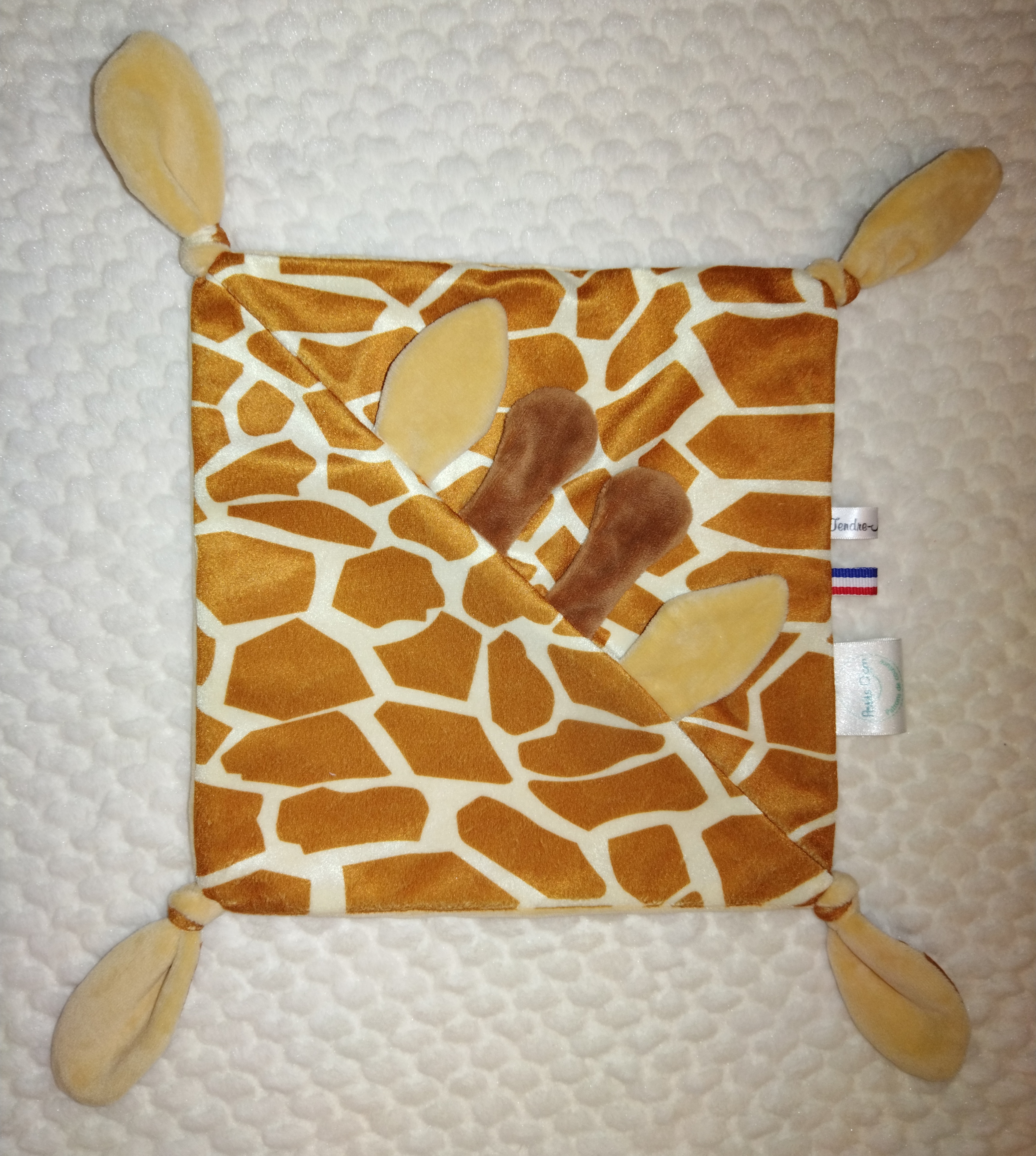 Tendre doudou girafon