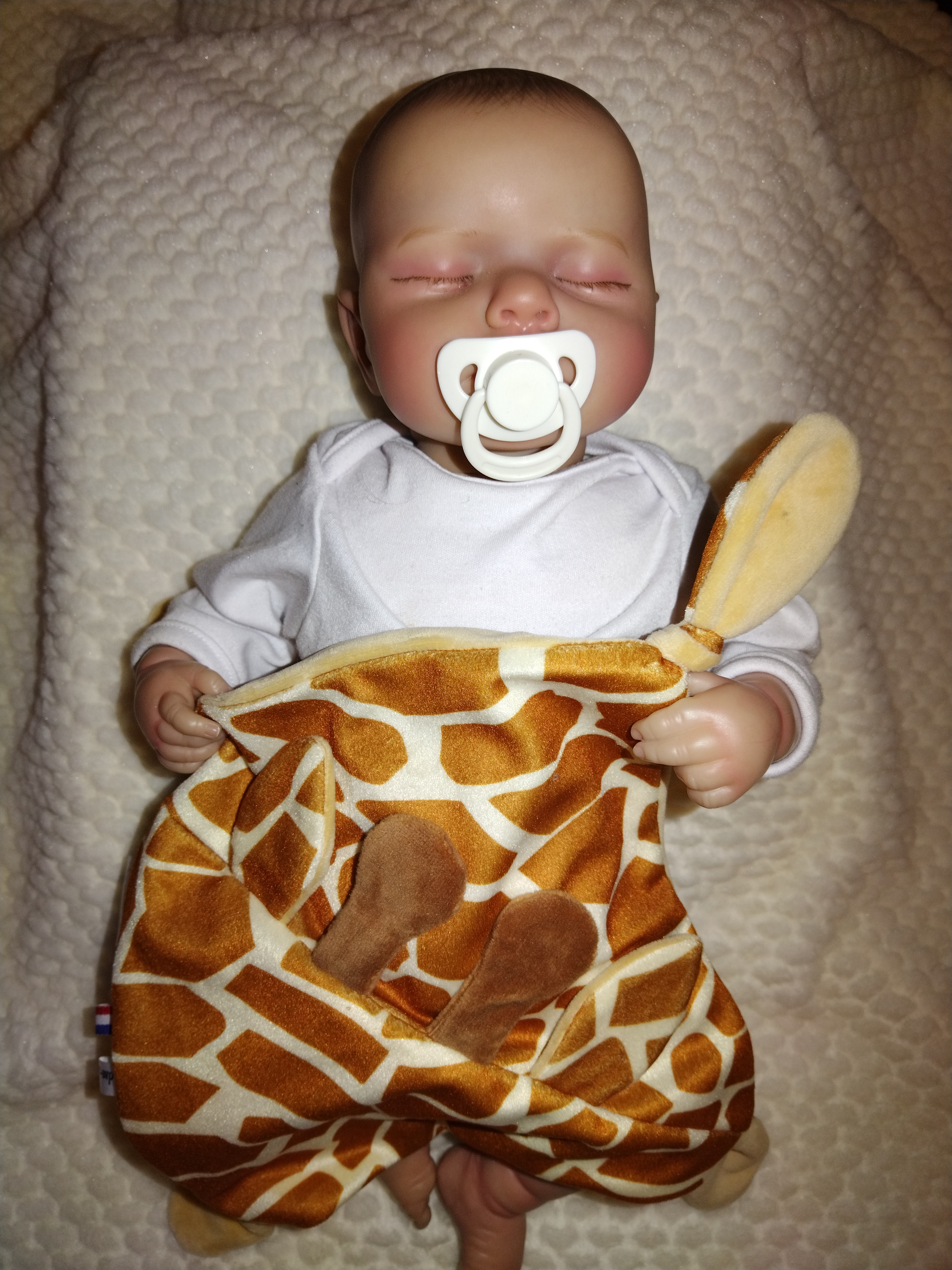 Tendre doudou girafon