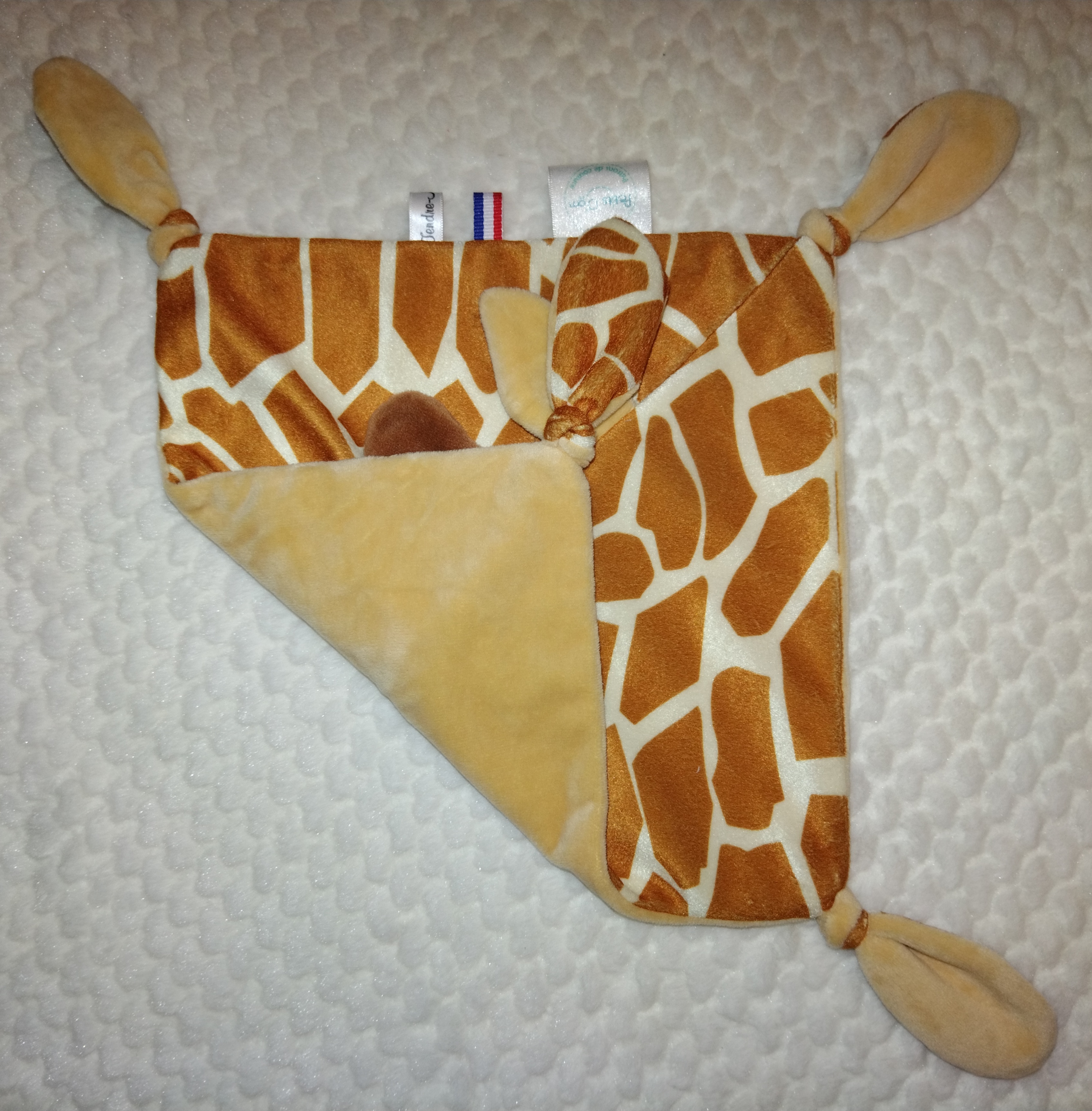 Tendre doudou girafon