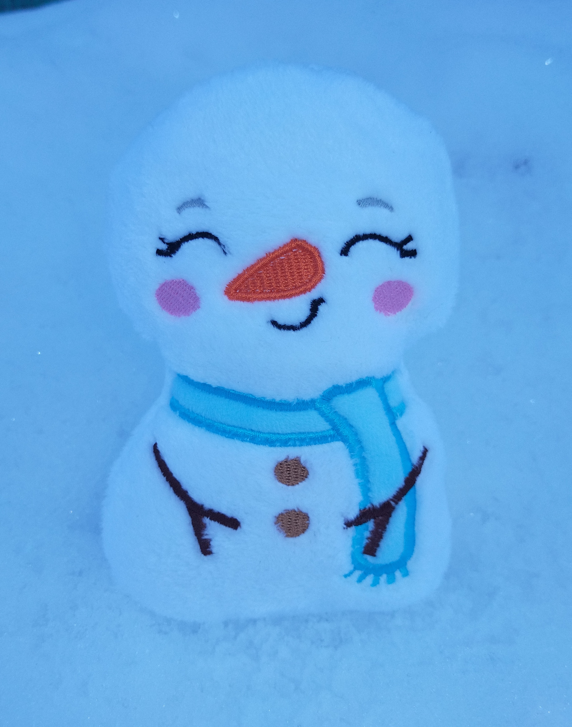 Peluche bonhomme de neige