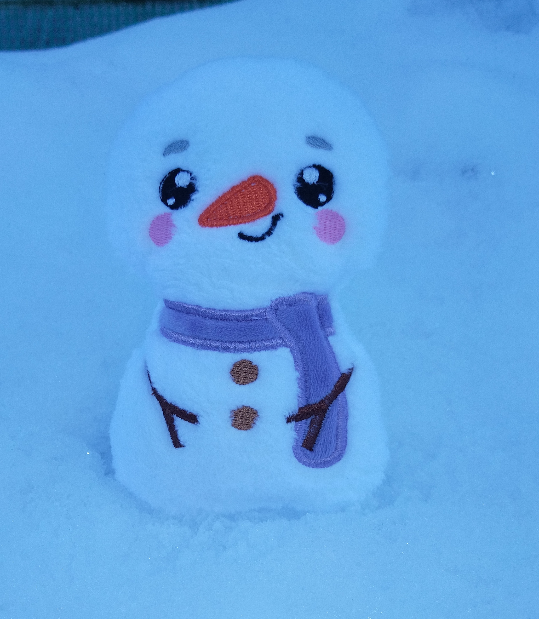 Peluche bonhomme de neige