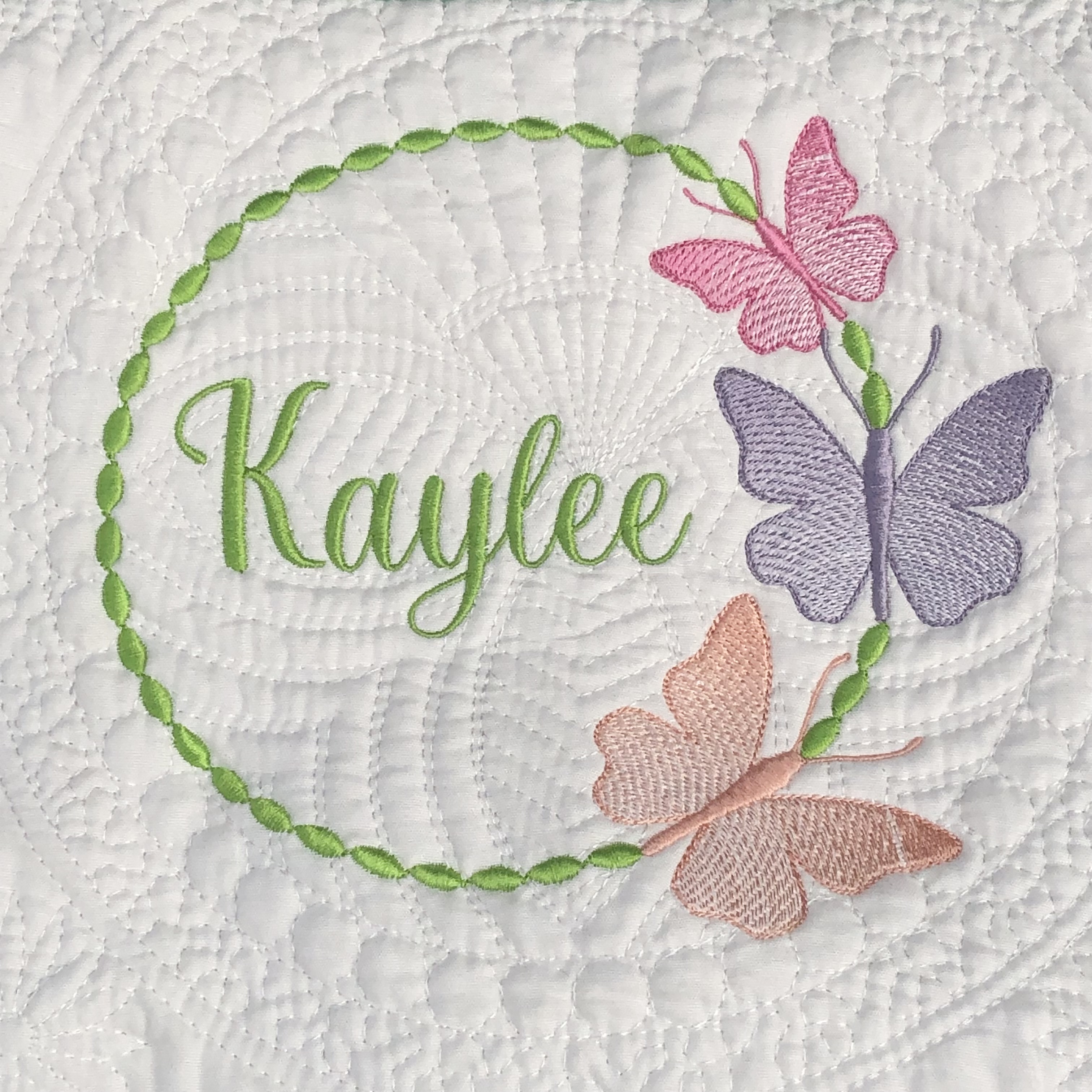 Personalised embroiderd  baby quilt hot pink border