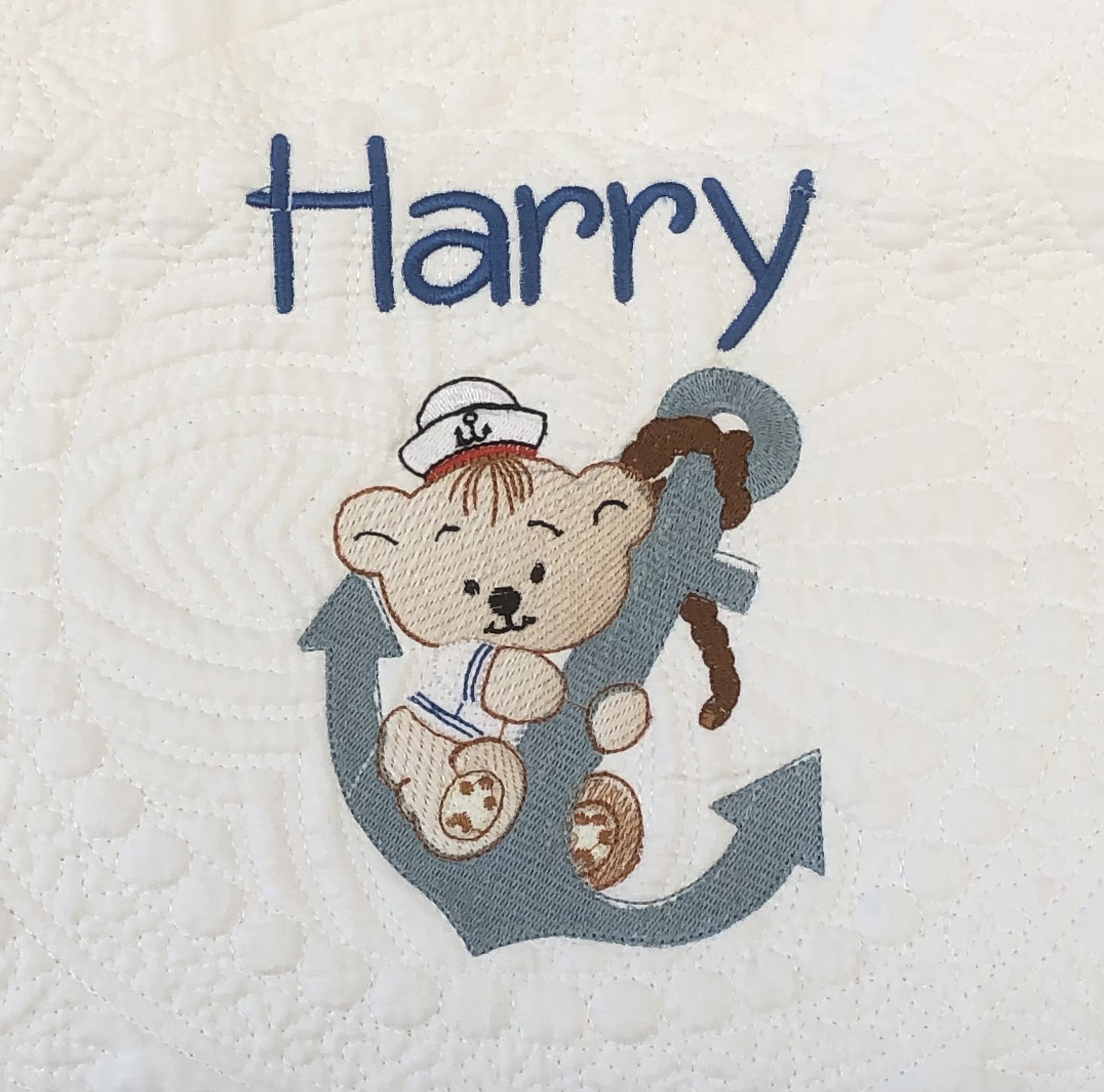 Personalised embroiderd  baby quilt navy blue border