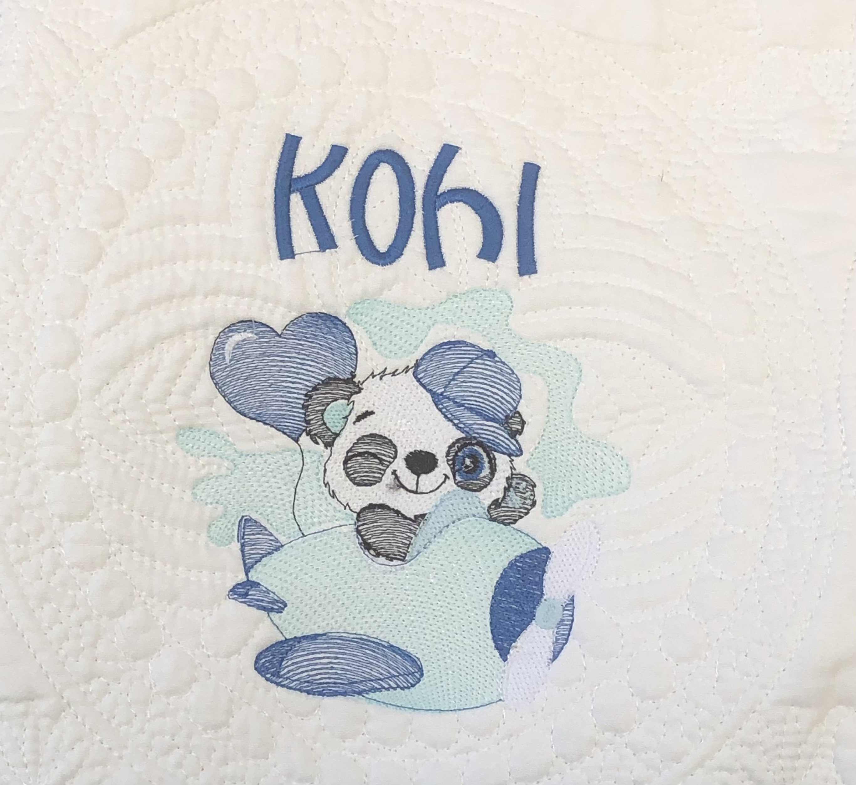 Personalised embroiderd  baby quilt navy blue border