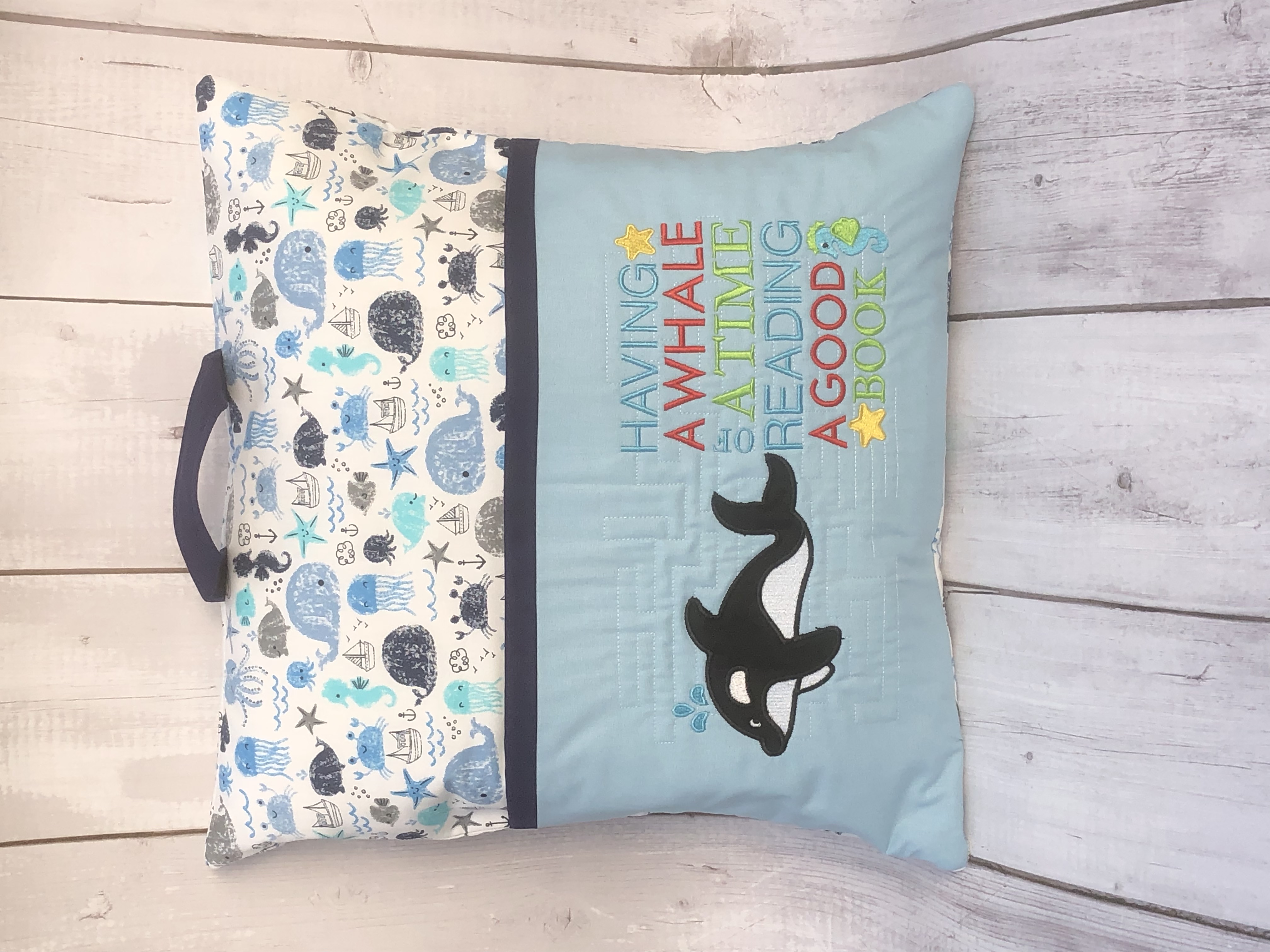 Whale reading pillow