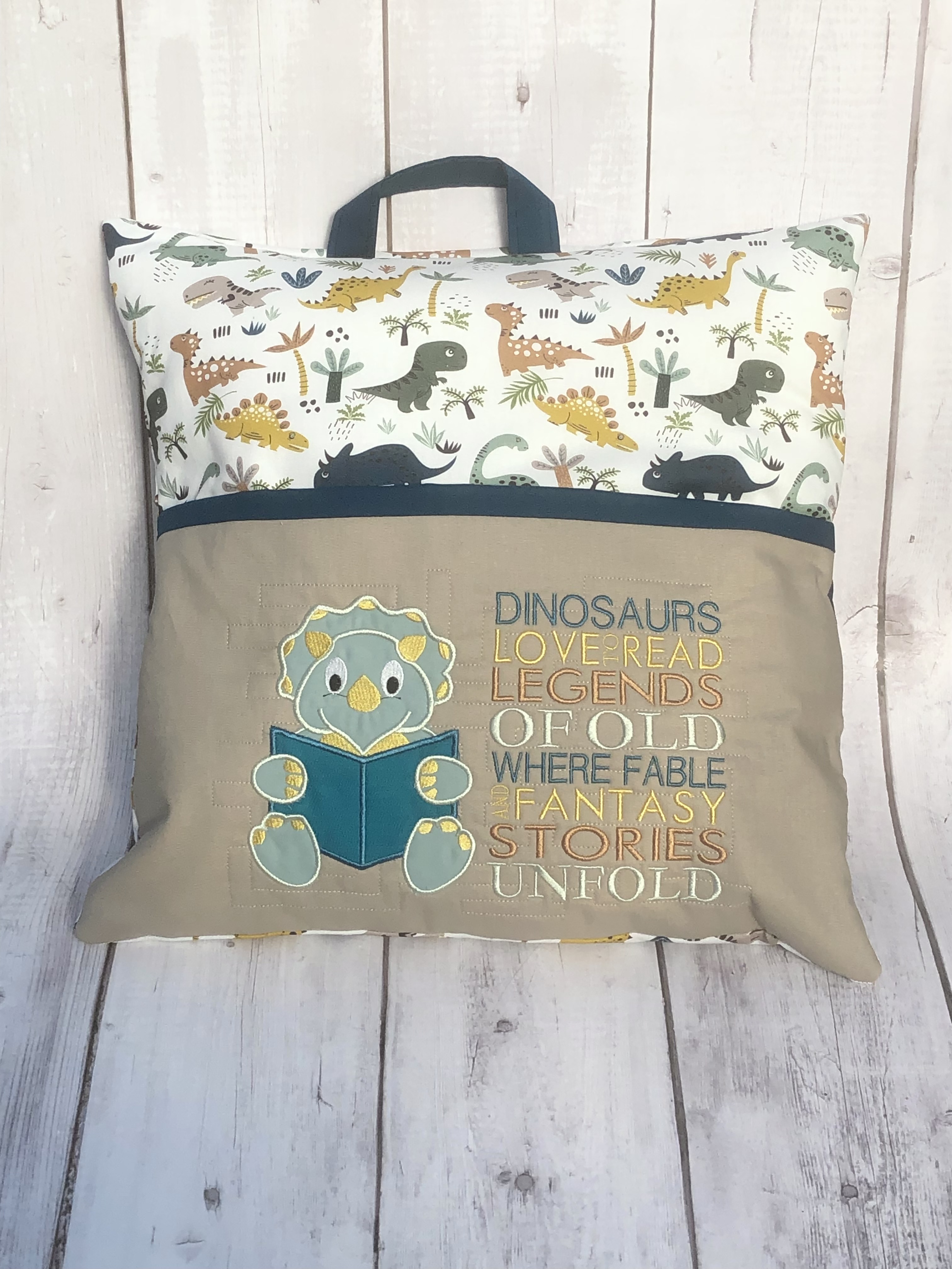 Dinosaur reading pillow