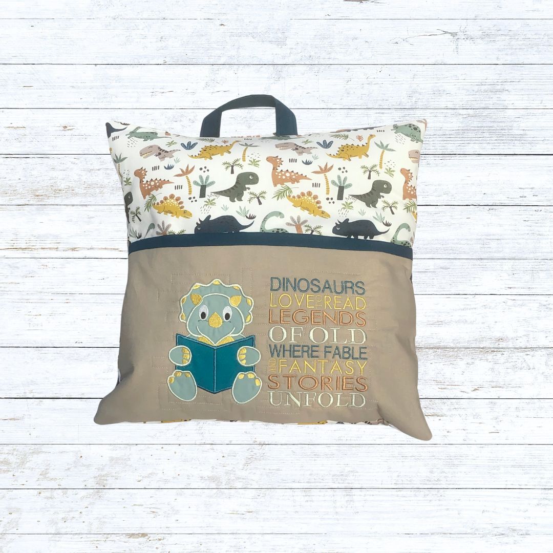 Dinosaur reading pillow