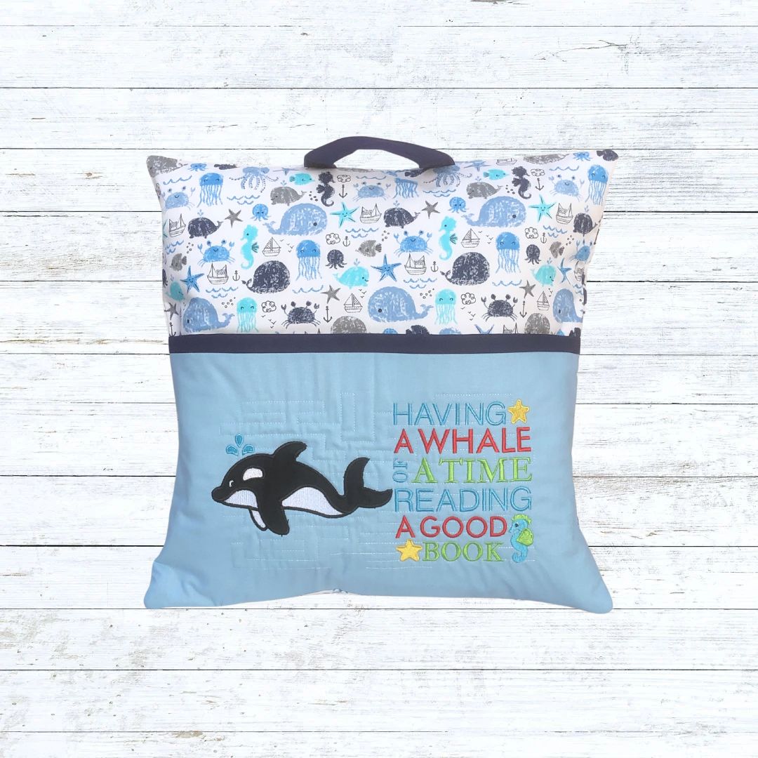 Whale reading pillow
