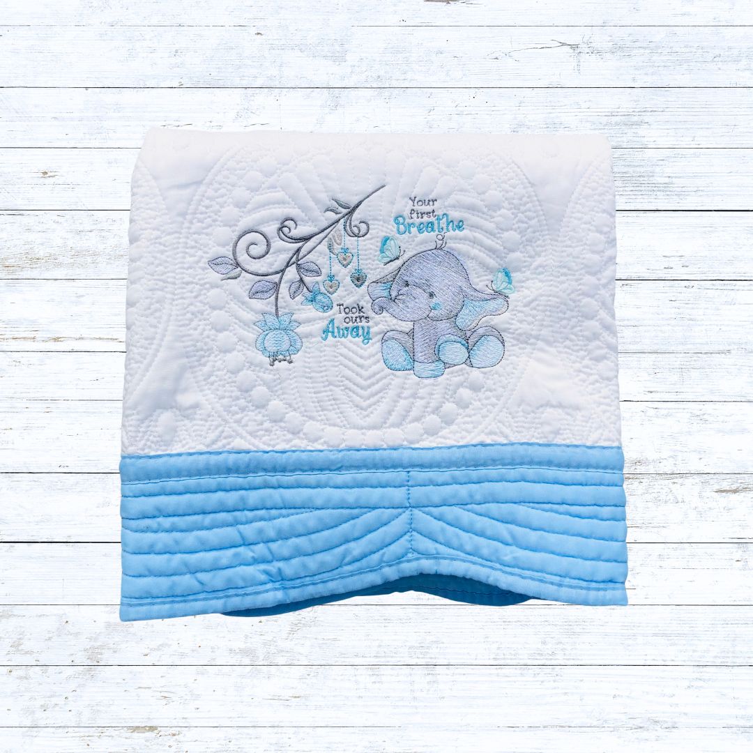 Personalised embroiderd  baby quilt light blue  border