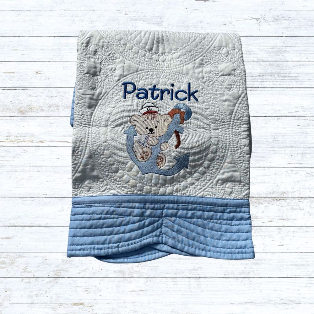 Personalised embroiderd  baby quilt light blue  border