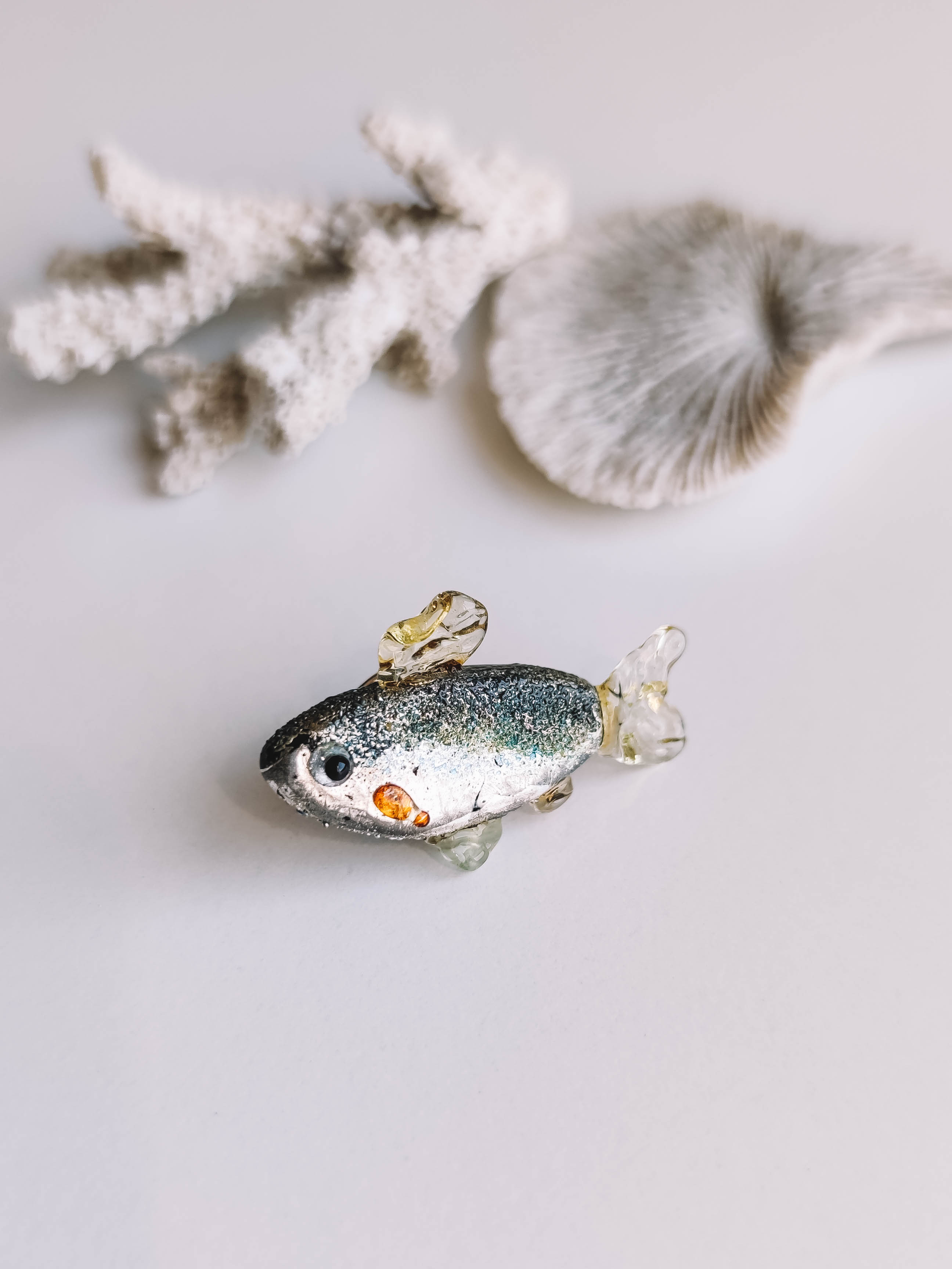 Fish badge brooch