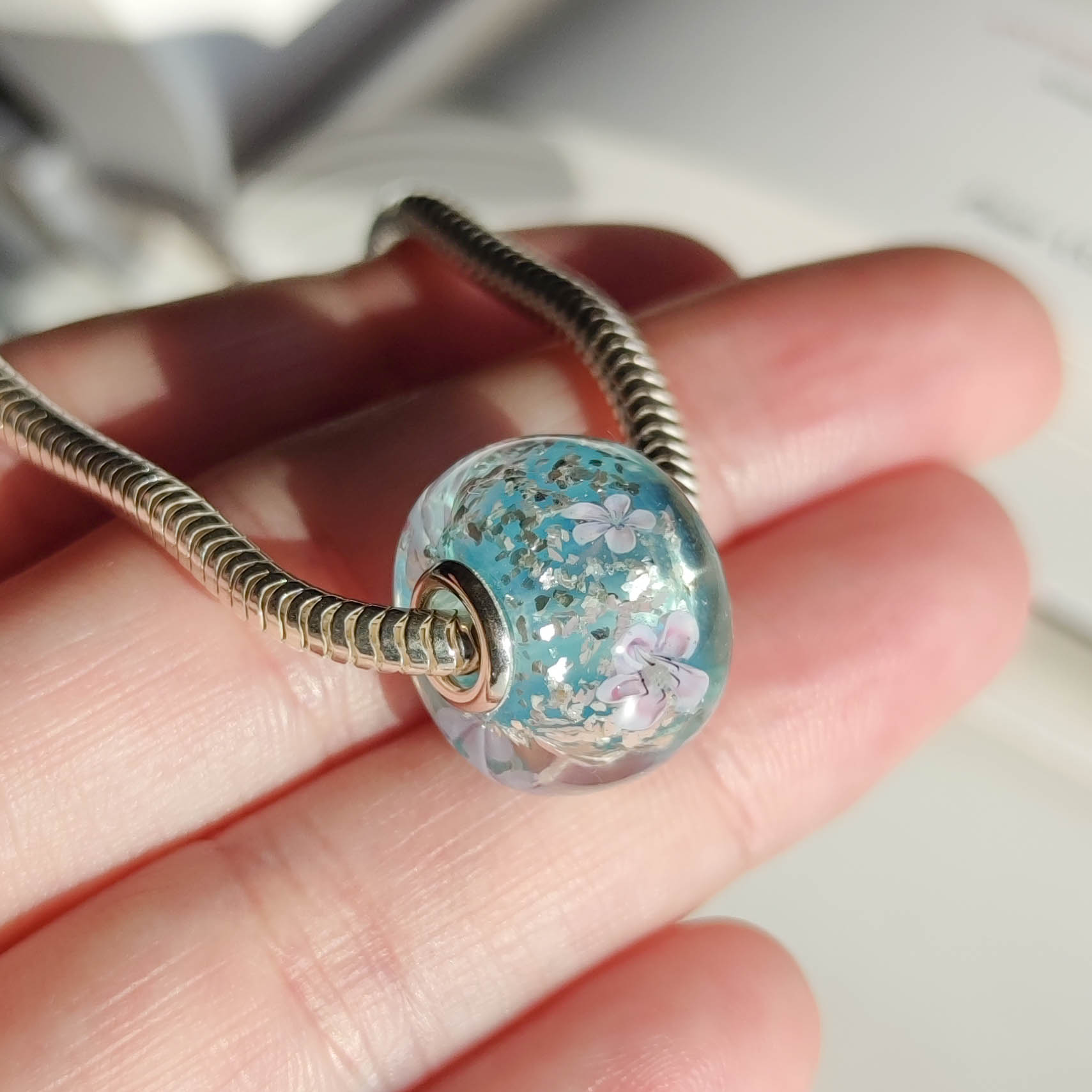 Sakura on blue, silver flakes