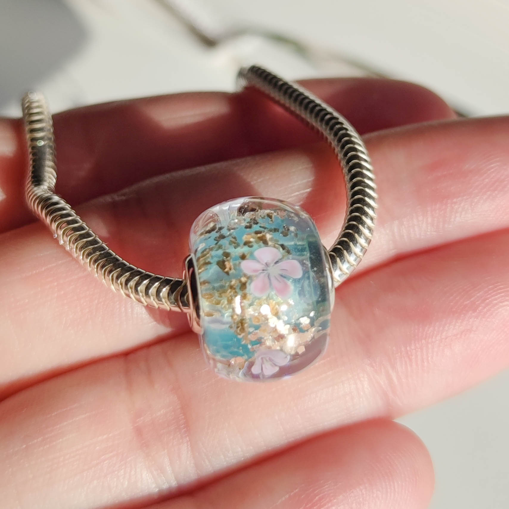 Sakura on blue, gold flakes